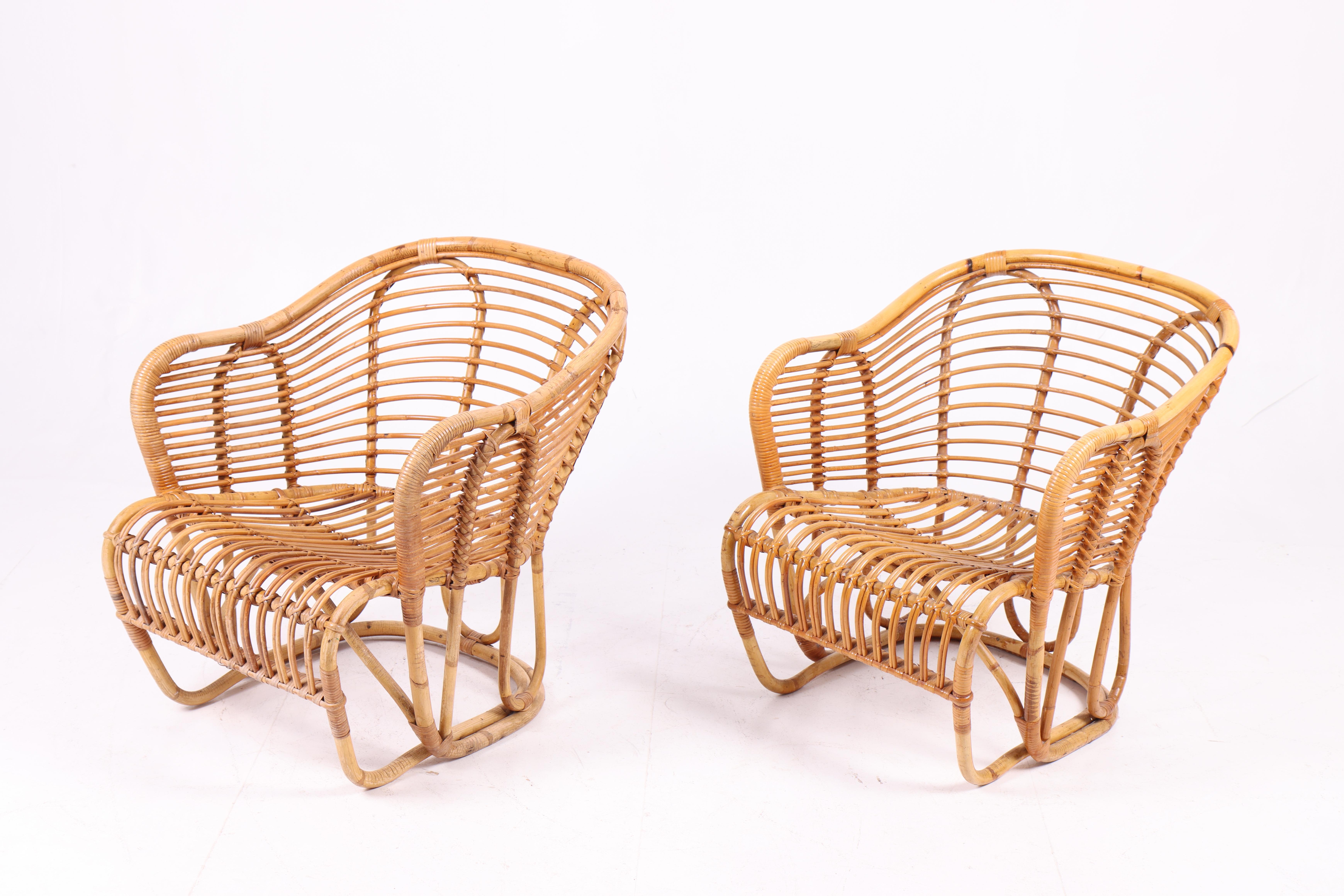 Pair of great looking lounge chairs designed by Tove and Edvard Kindt-Larsen and made by R. Wengler in the 1950s. Made in Denmark. Great original condition.