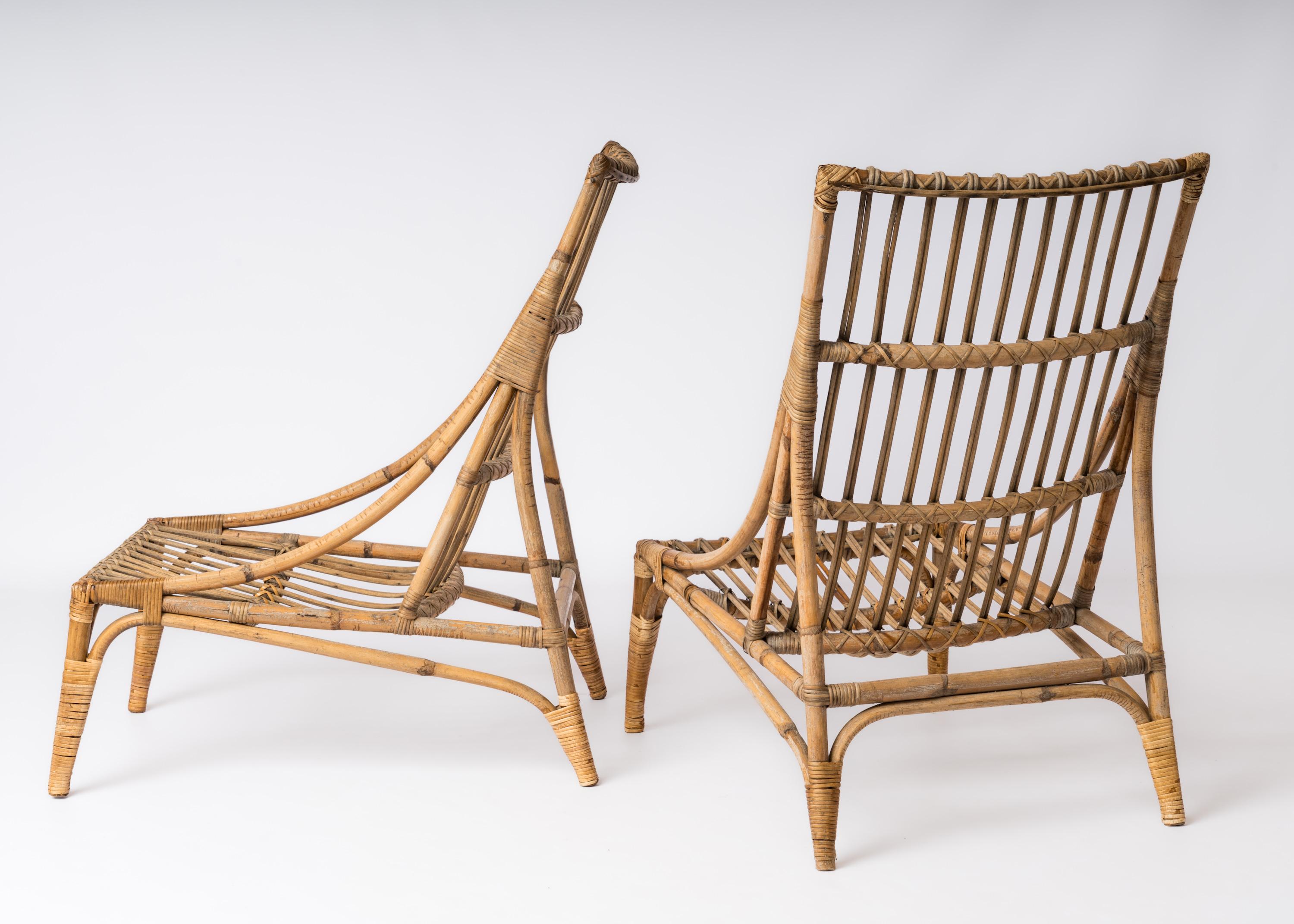 French Pair of Rattan Lounge Chairs in the style of Audoux Minnet - France 1960's For Sale
