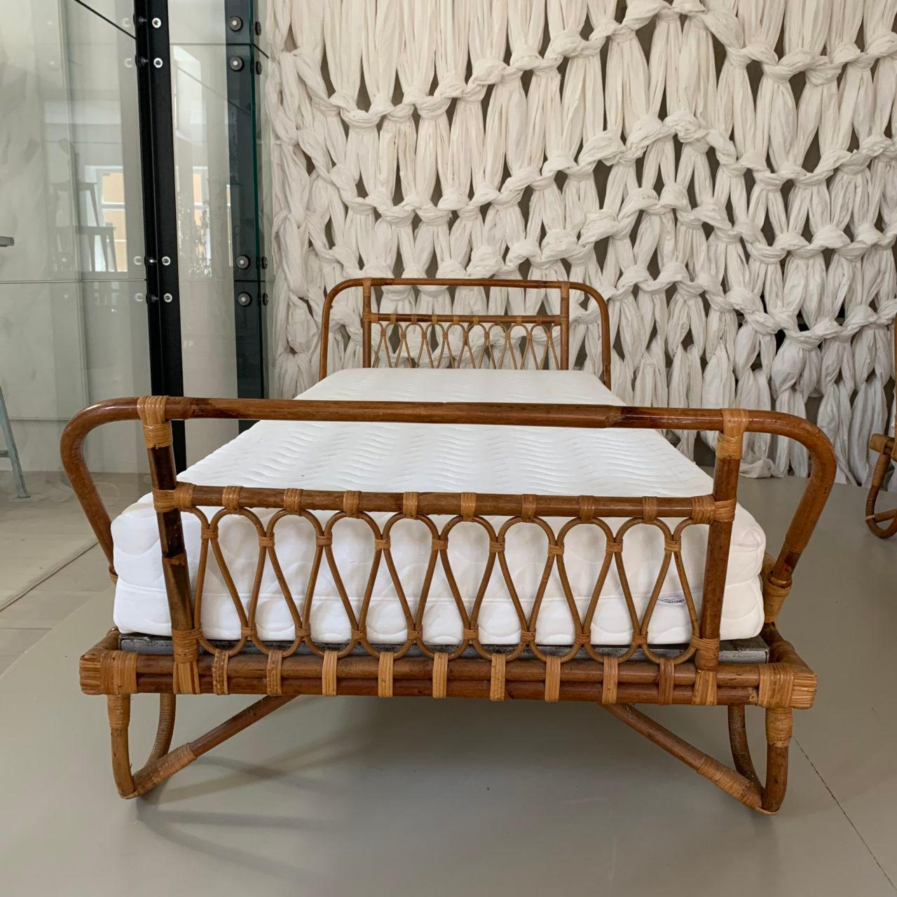 A rare and fabulous pair of 1940s / midcentury French daybeds or beds, originally from a convent in the South of France. Beautifully curvaceous formed rattanwork. In perfect condition, and with a wonderful play between the dark and pale rattan