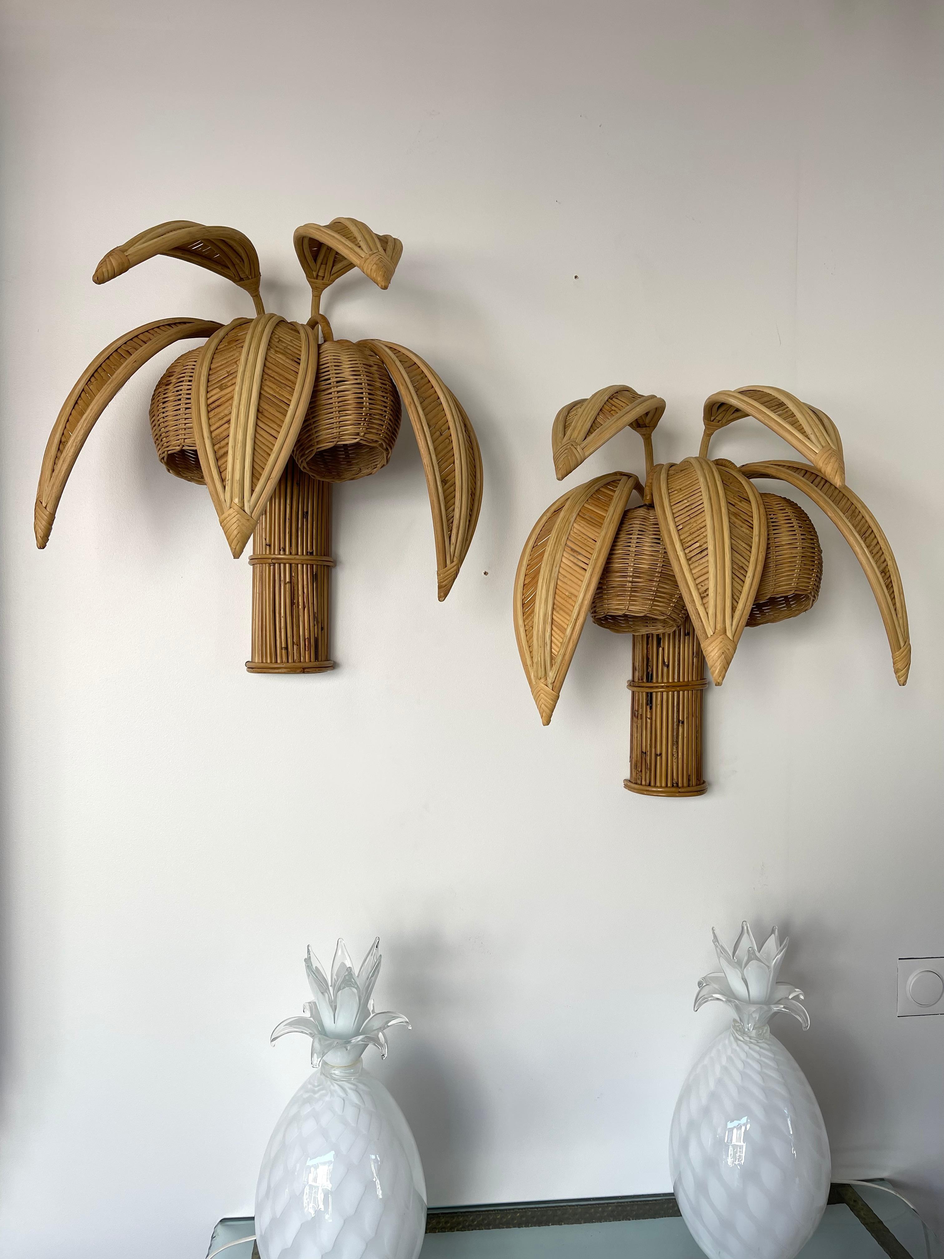 Pair of rattan wicker palm tree coconut sconces wall lights lamps . Artisanal work in the style of Mario Lopez Torres, Galerie Maison & Jardin, Jansen, Dal Vera, Vivai Del Sud, Hollywood Regency.