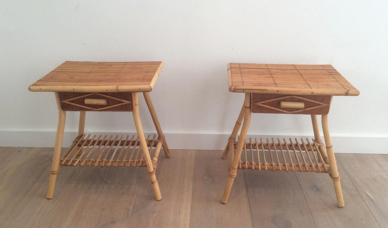 This very nice pair of side tabes are made of rattan. This is a French work, circa 1970.