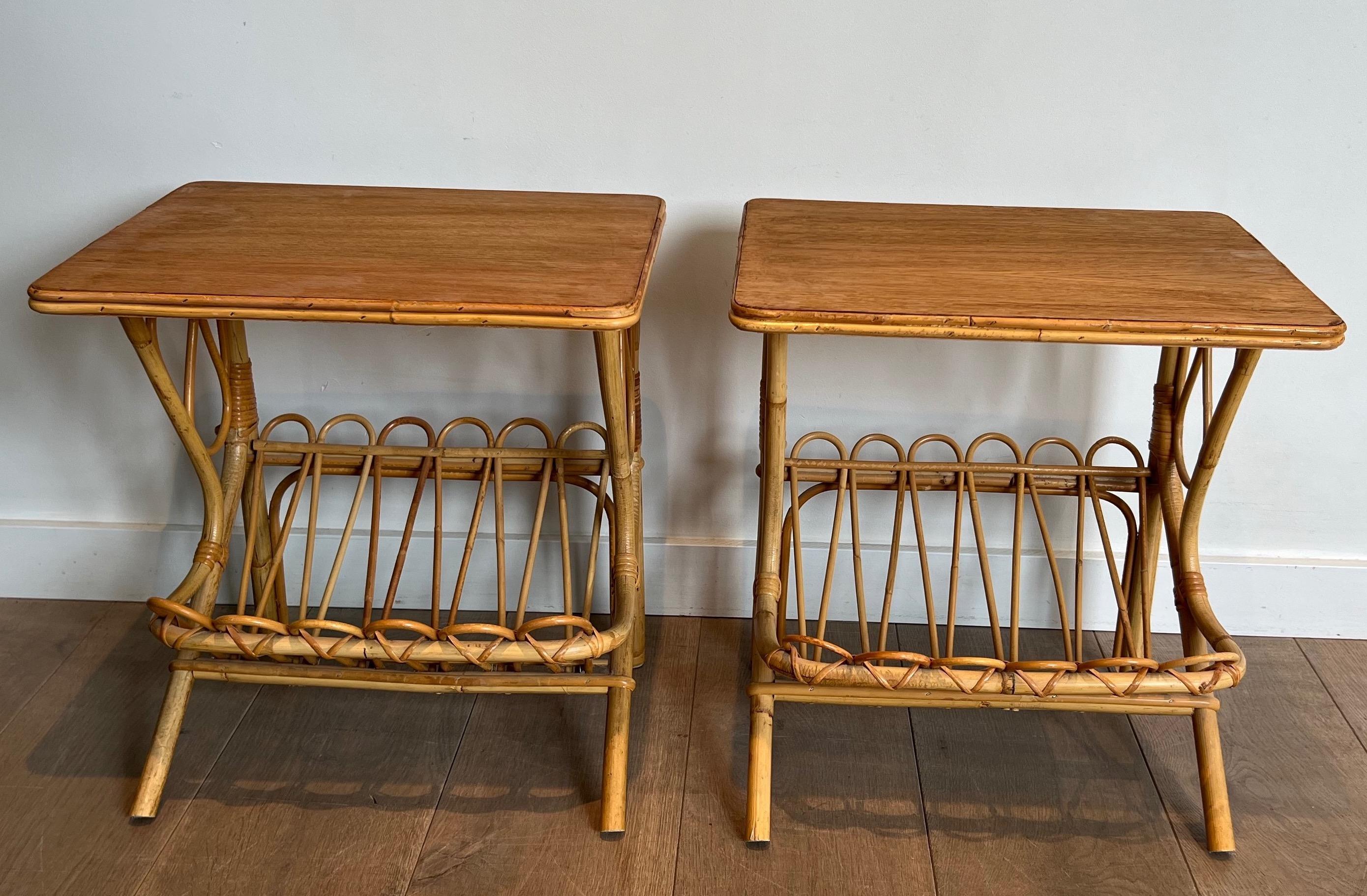 This pair of side tables-magazine racks is made of rattan. This is a French work. circa 1950.