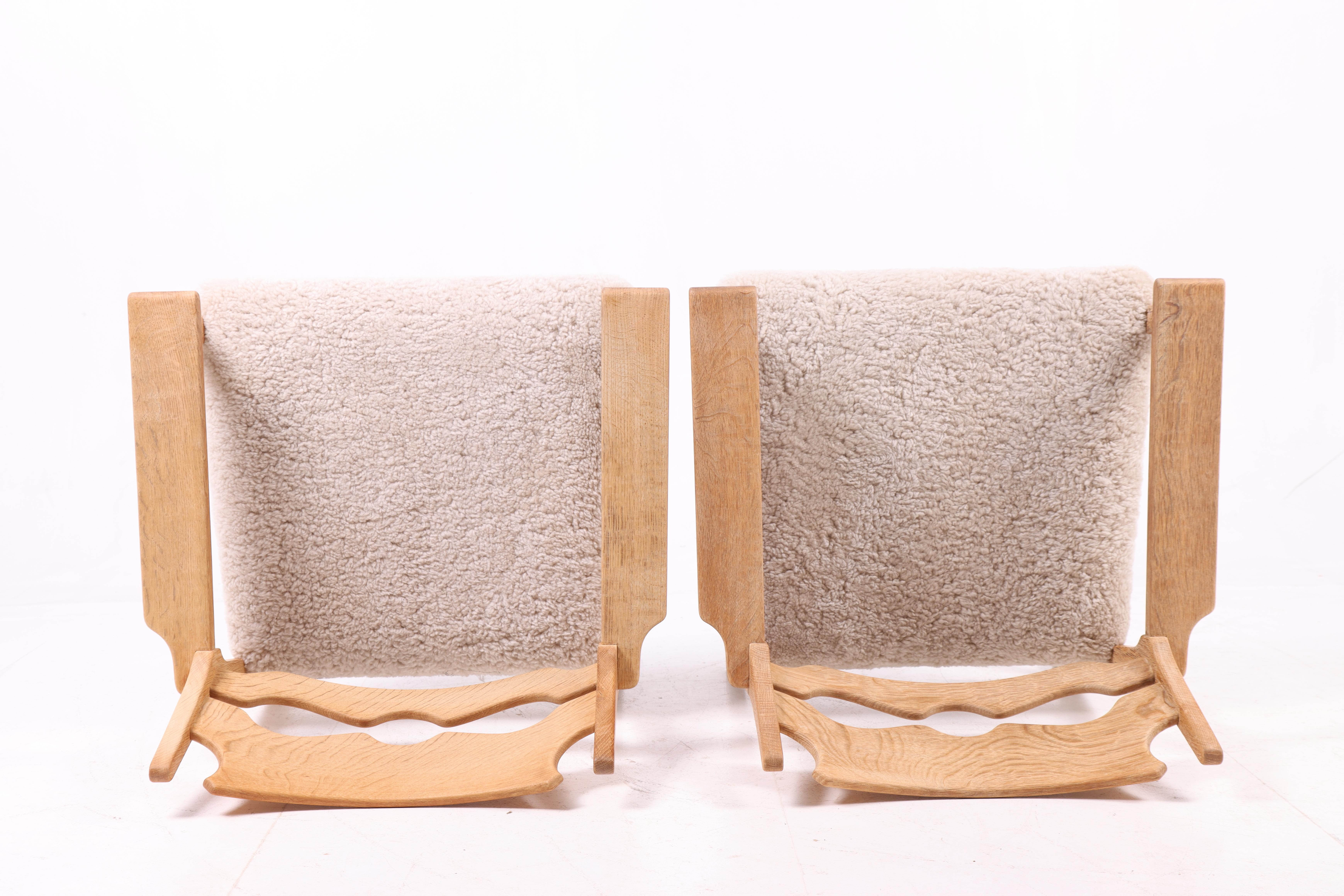 Pair of Razor blade Chairs in Oak by Henning Kjærnulf, 1960s Escandinavo moderno en venta