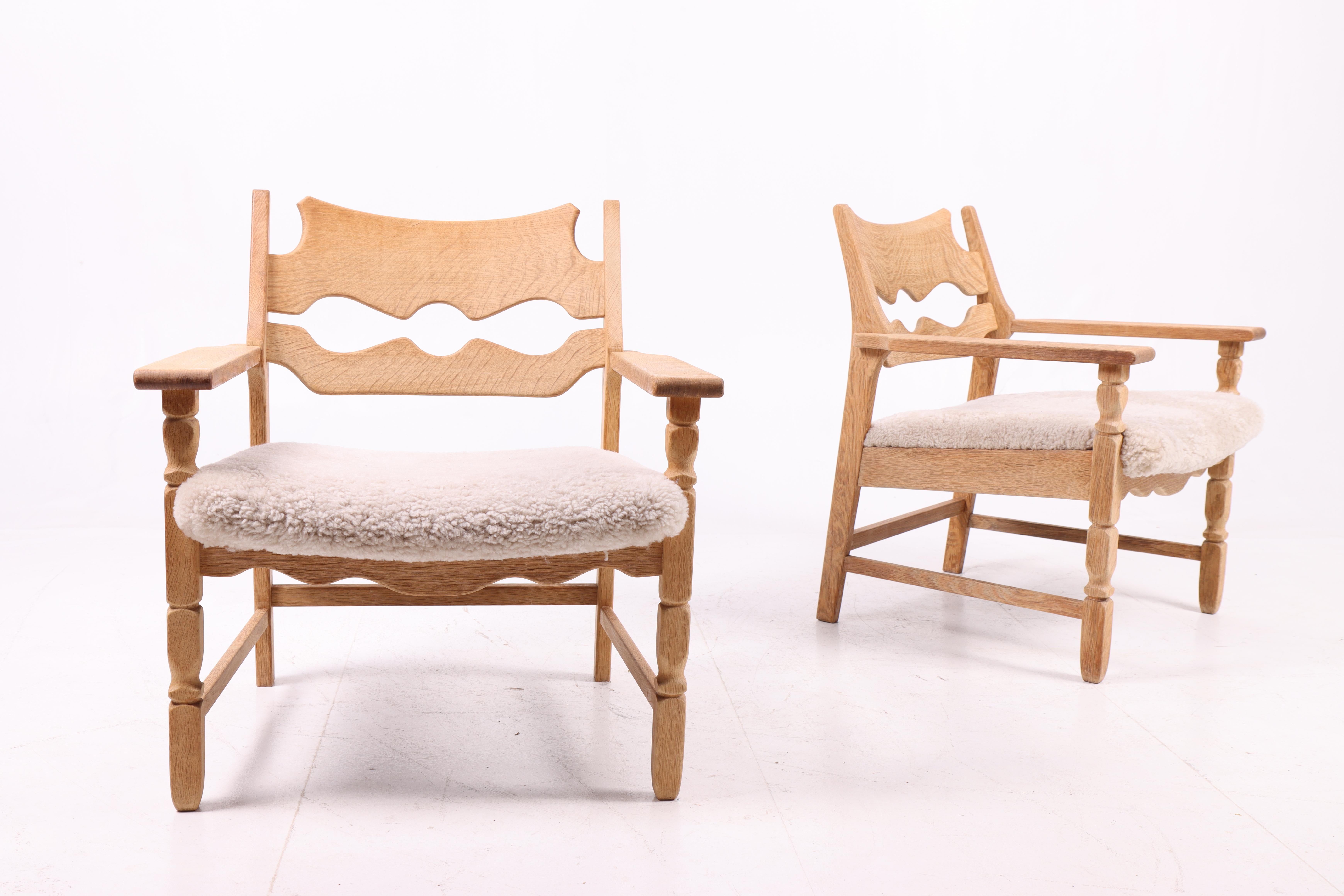 Pair of Razor blade Chairs in Oak by Henning Kjærnulf, 1960s Danés en venta