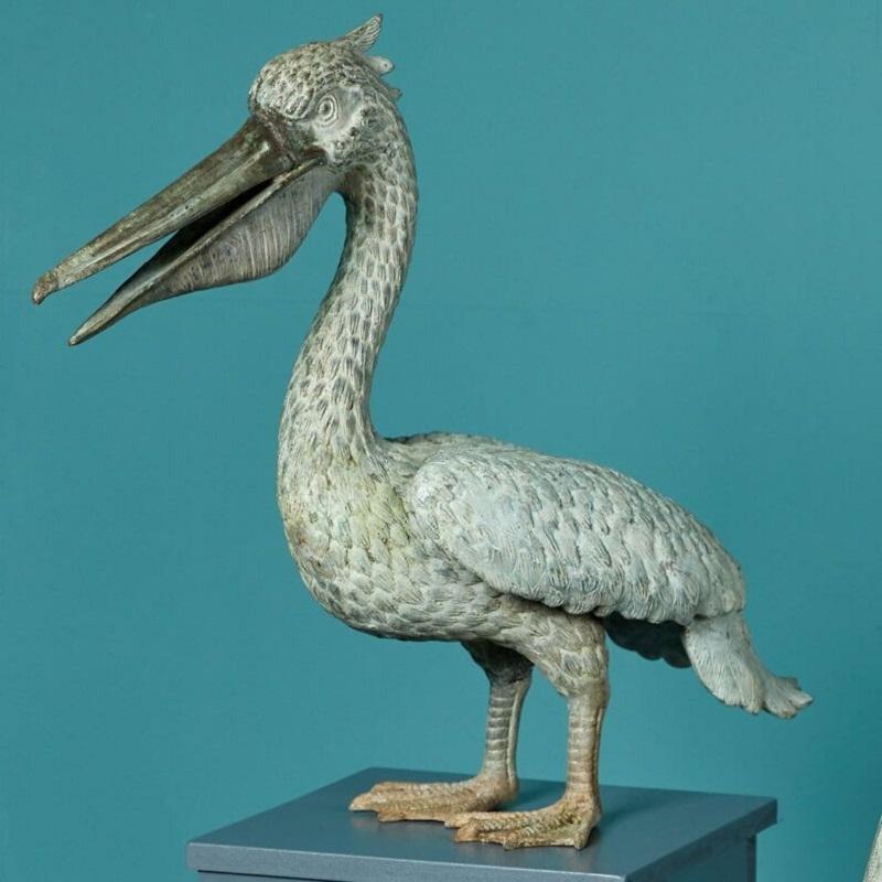 English Pair of Reclaimed Bronze Pelican Statues For Sale