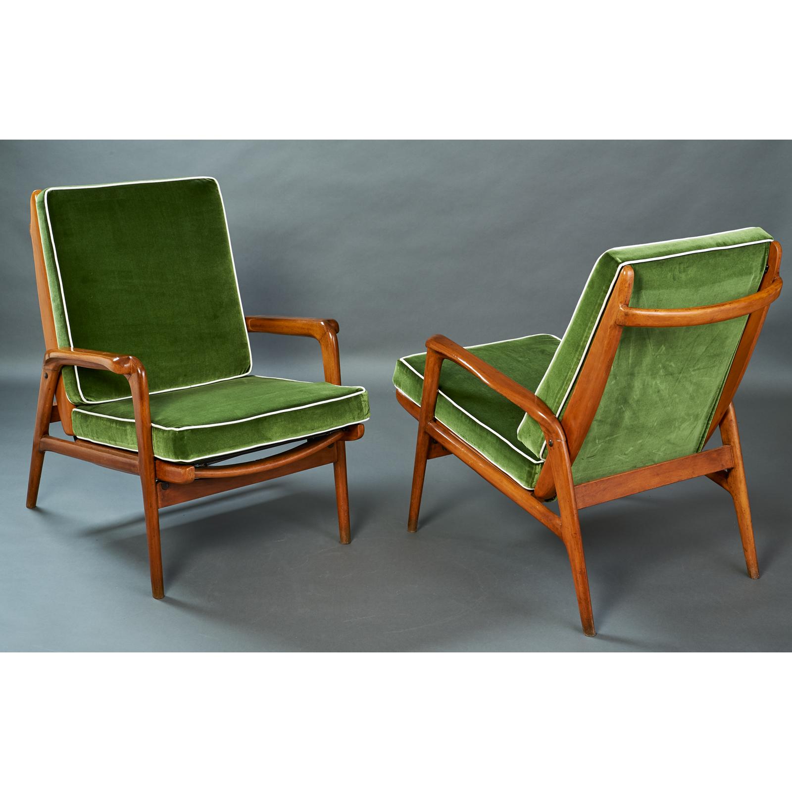 Italy, 1950s
Pair of reclining polished wood armchairs with shaped armrests and back grasp
Dimensions: 26 W x 34 D x 17 high @ seat, 34 H @ back.
