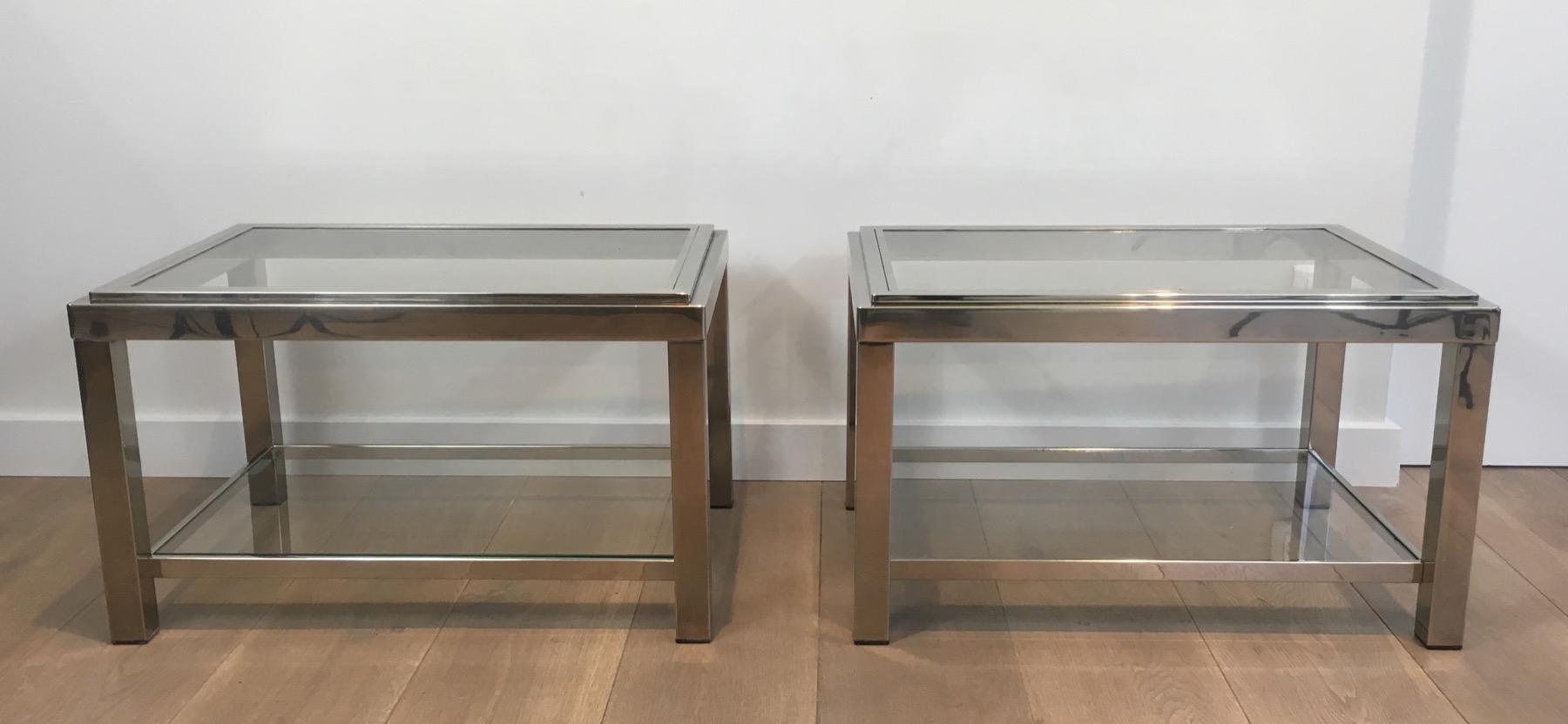 This pair of rectangular side tables is made of chrome. This is a French Word. Circa 1970.