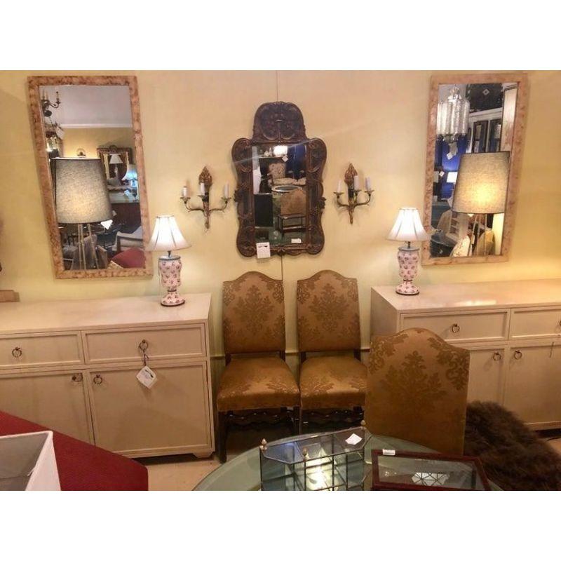 A fine pair of rectangular Hollywood Regency style faux marble wall, console or pier mirrors. Each having the look and feel of actual marble with brownish and orange tones.