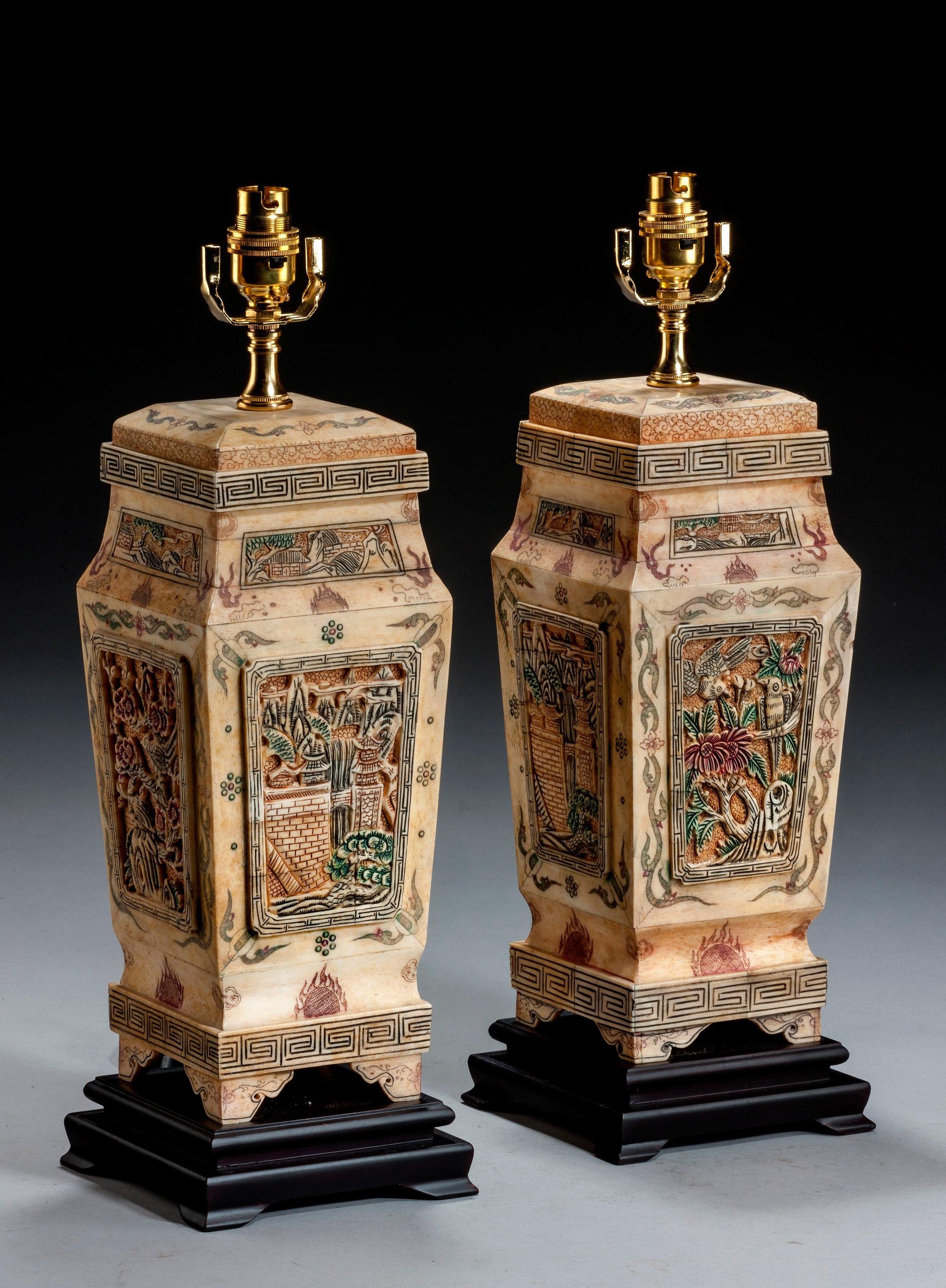 Pair of rectangular lamps, with profusely carved and tinted panels. Modern.
