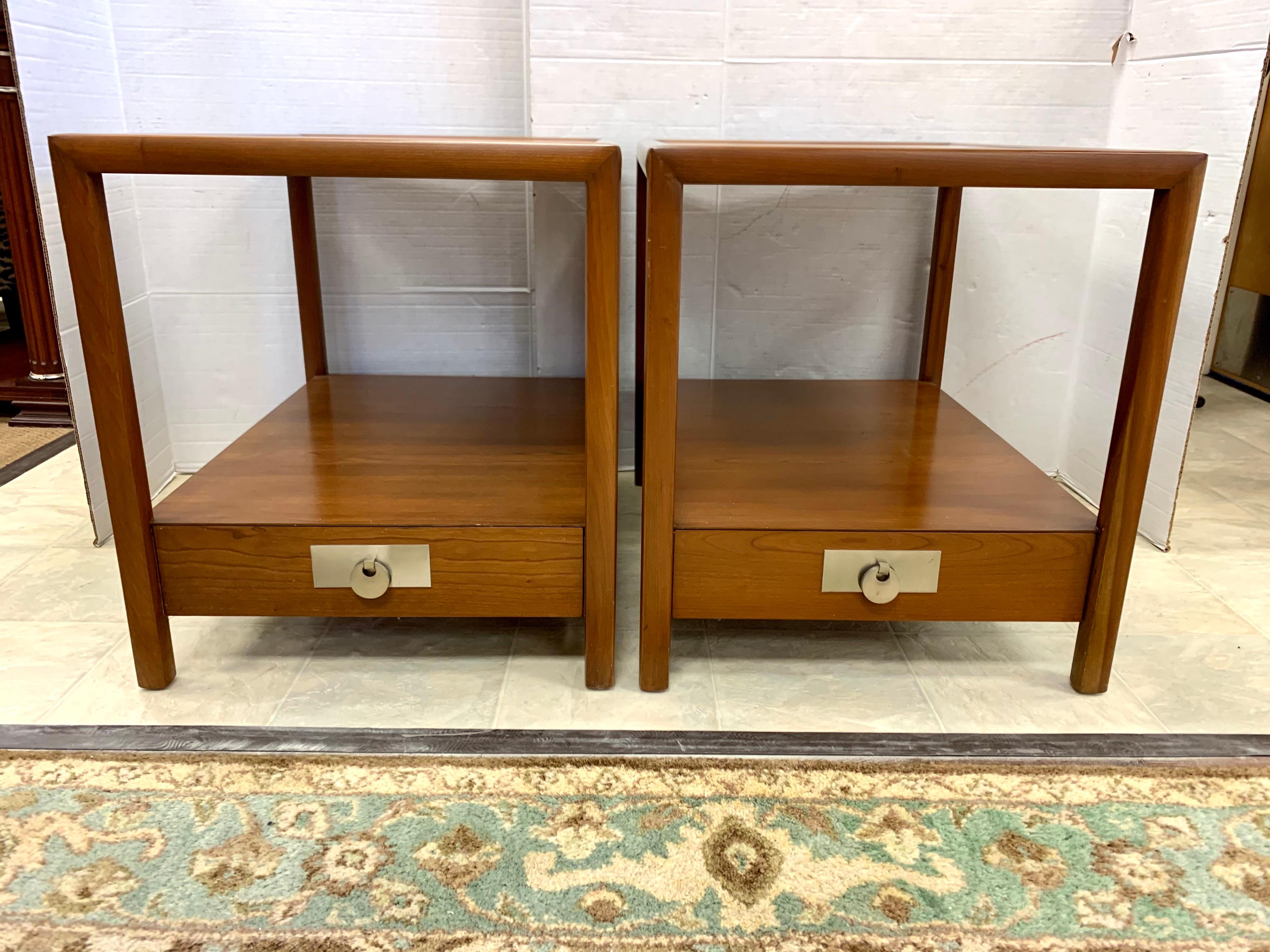 Rare matching pair of rectangular two tiered end tables by Michael Taylor for Baker Furniture’s iconic New World collection. All manufacturer hallmarks present. Price is for the pair, why pay $15,000.00 and up?