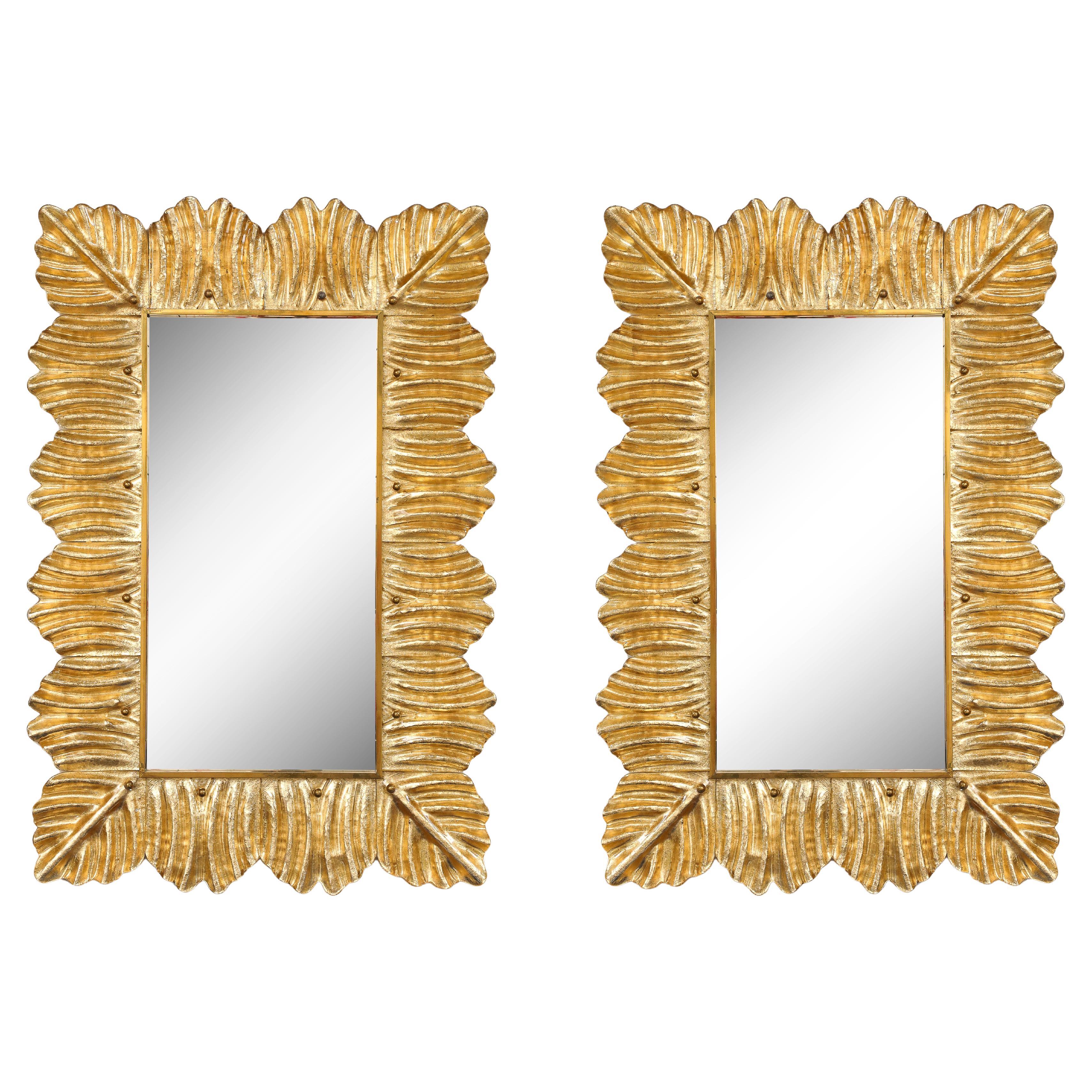 Pareja de espejos rectangulares de cristal de Murano con detalles de pan de oro y latón, Italia