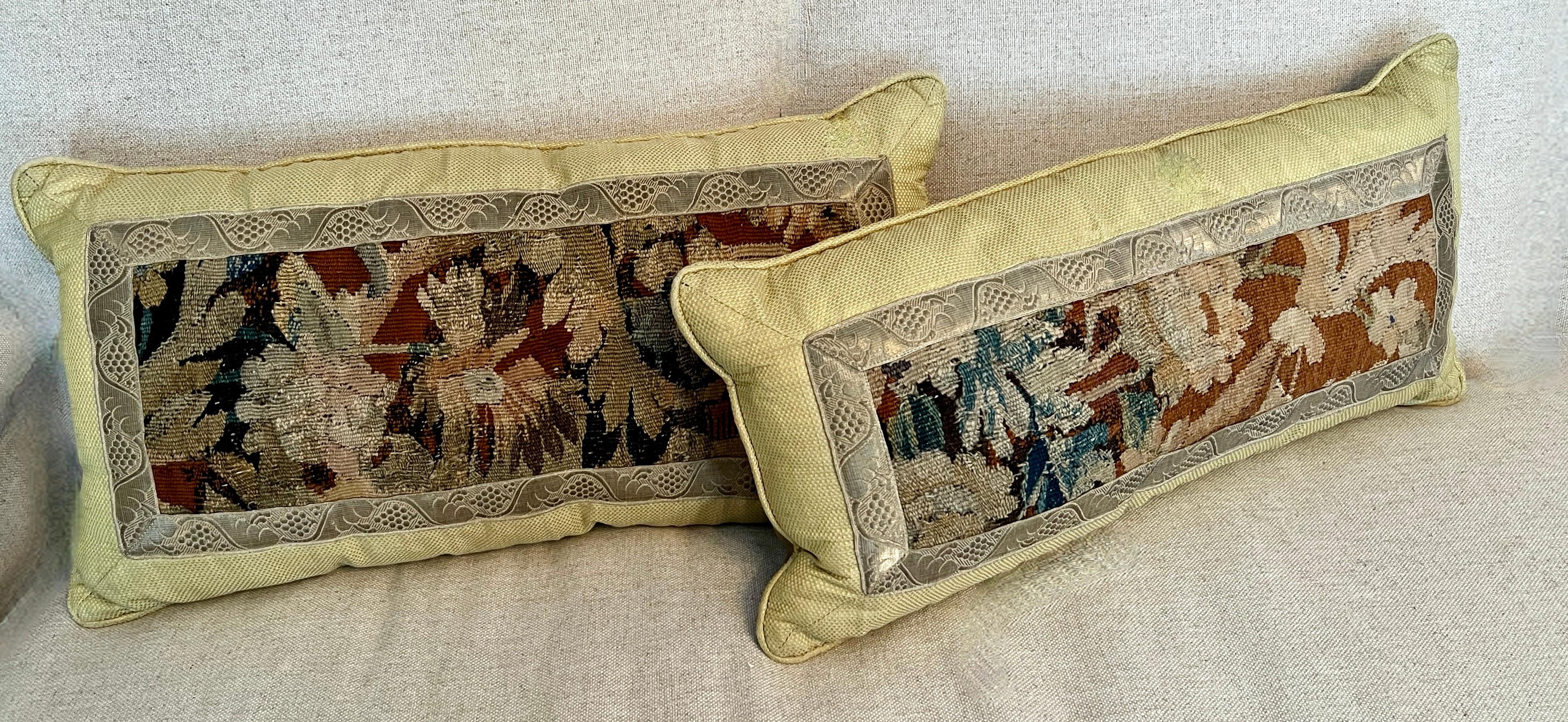 Pair of rectangular or lumbar pillows with needlepoint featured in the center of two alternative fabrics one with a complimentary pattern, and an outer frame in soft golden yellow.

A compliment to any sophisticated sofa or pair of chairs, and nice