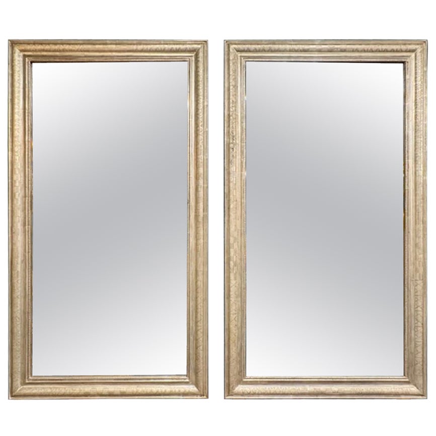Pareja de espejos rectangulares Louis Philippe de plata en venta
