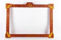 Pair of Red and Gold Lacquered Wooden Frames with Geometric Frieze Decoration