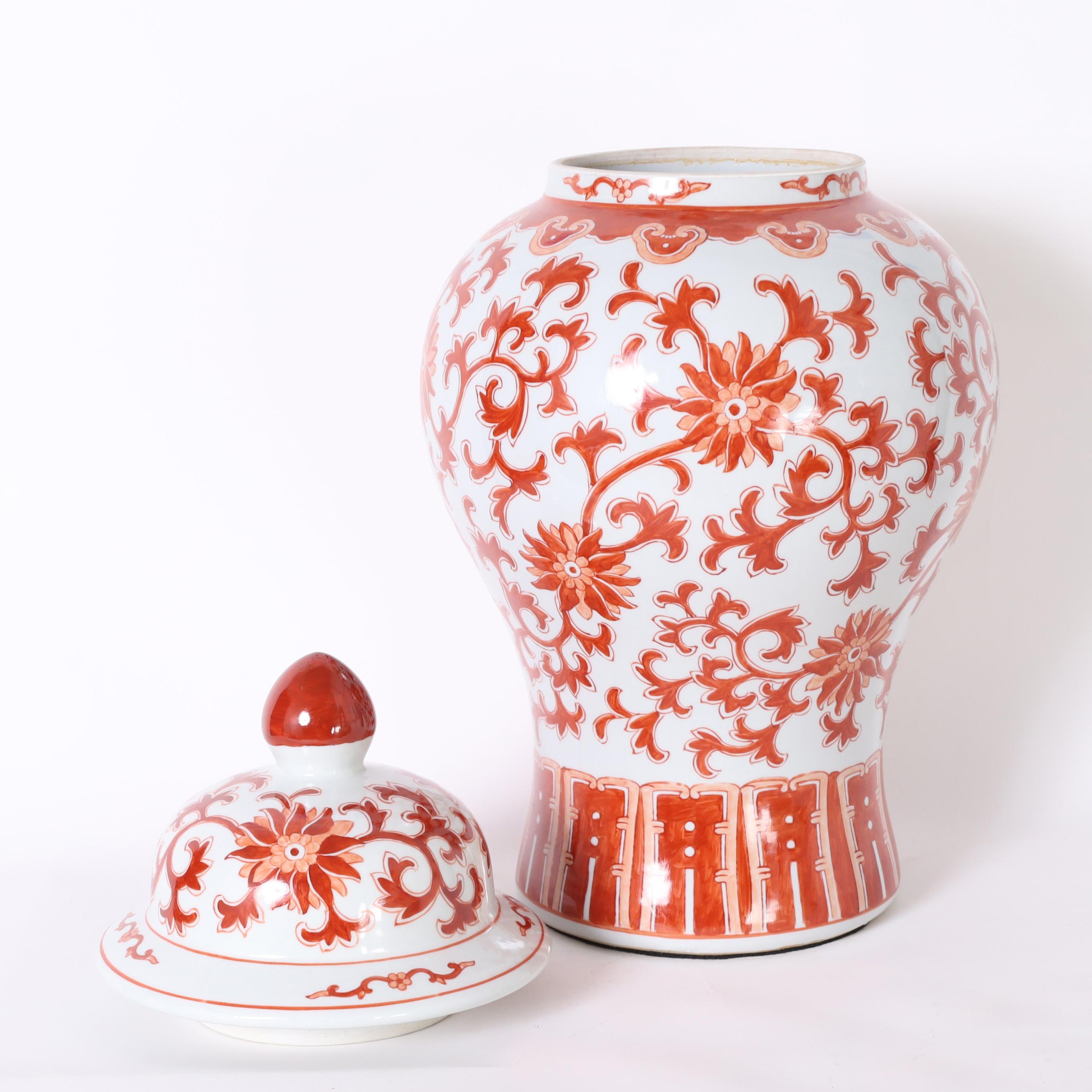 Contemporary Pair of Red and White Porcelain Lidded Urns or Jars For Sale