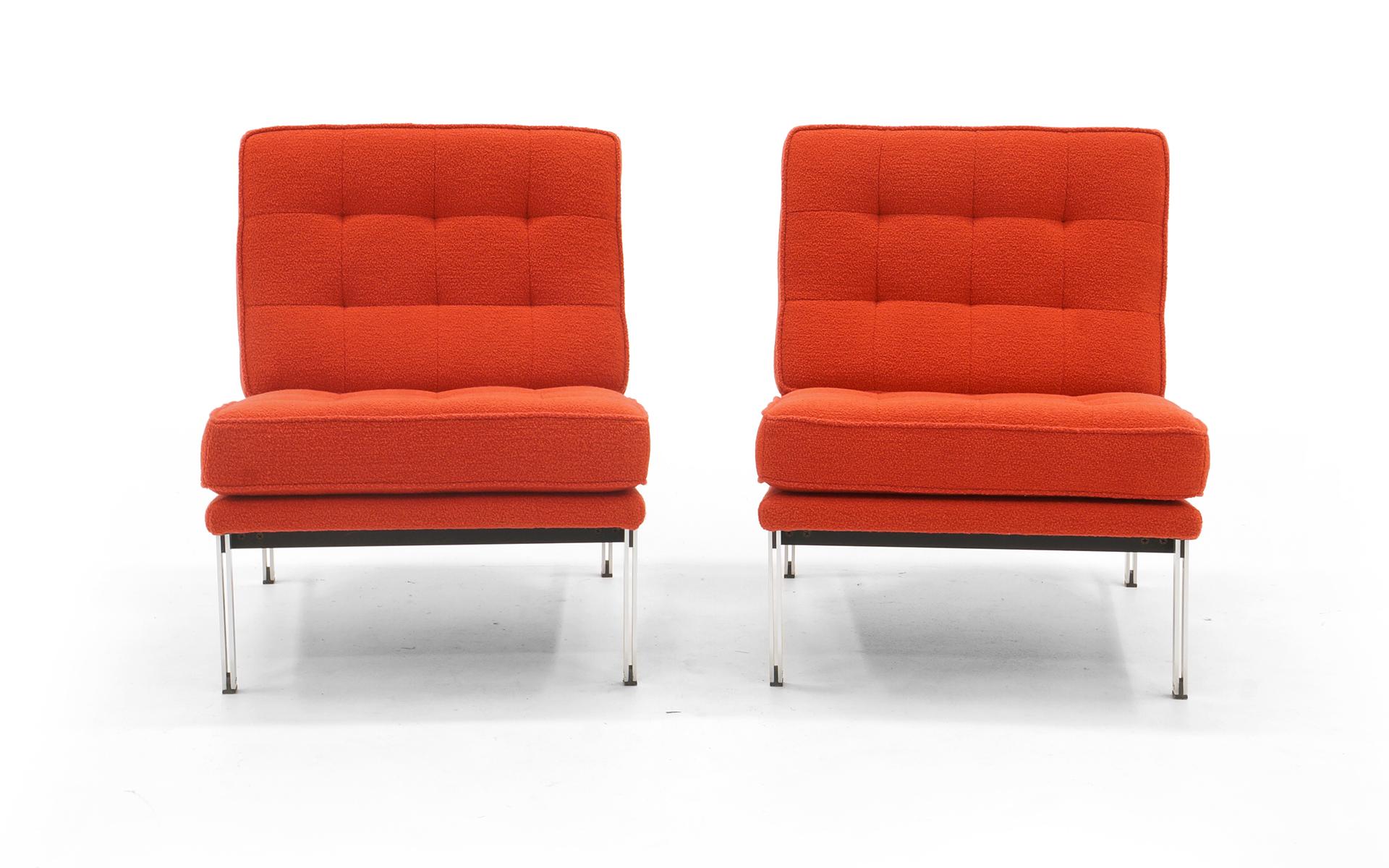 Pair of armless lounge chairs design by Florence Knoll for the Parallel Bar Series for Knoll. These have been expertly reupholstered in crimson Knoll classic boucle. The chromed steel frames date from the 1960s.