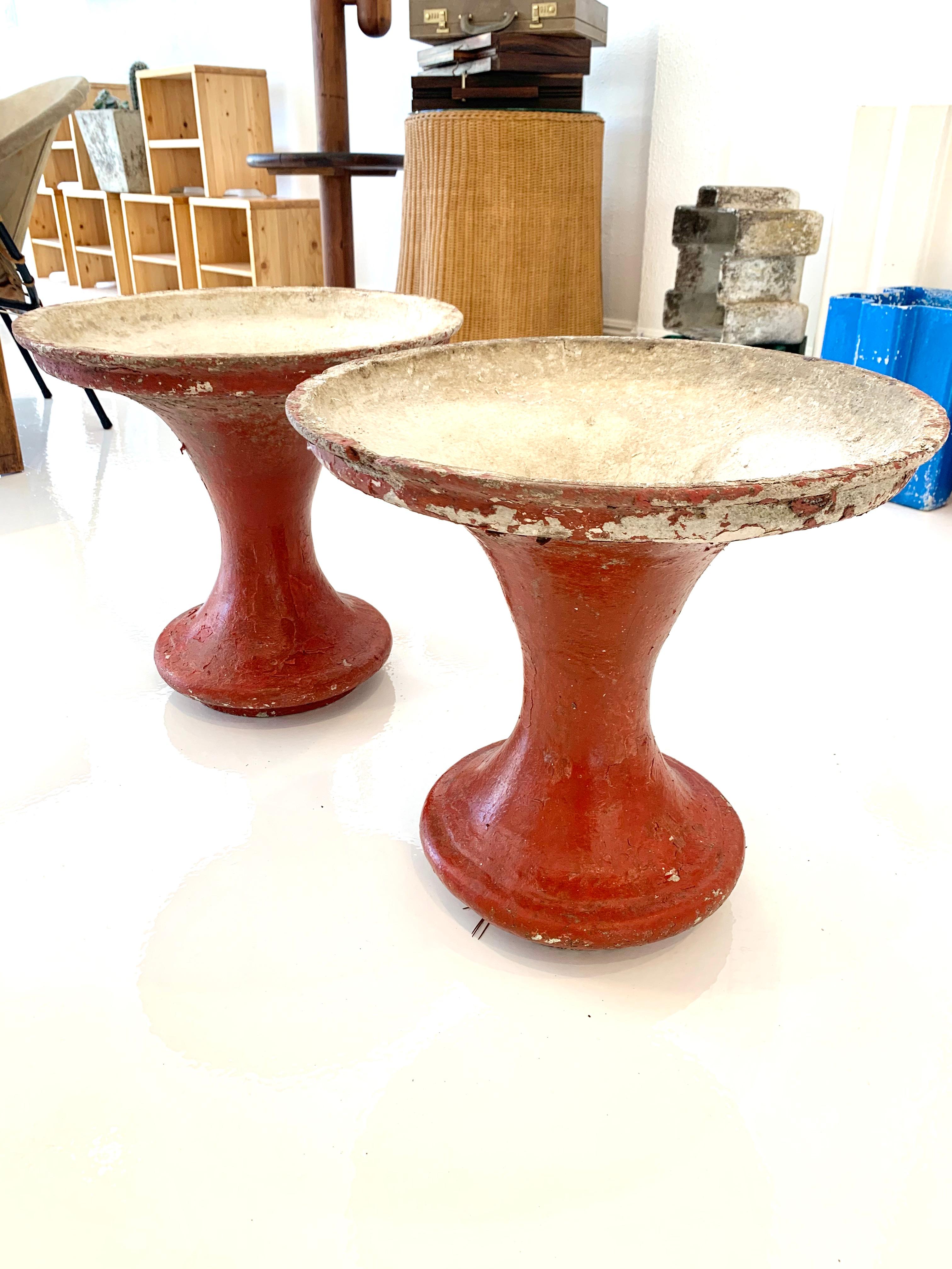 Pair of red concrete pedestal planters by Willy Guhl. In the shape of a champagne glass. Made in the 1960s in Switzerland. Red paint with excellent patina. Great vintage condition. Priced as a a pair. 




  