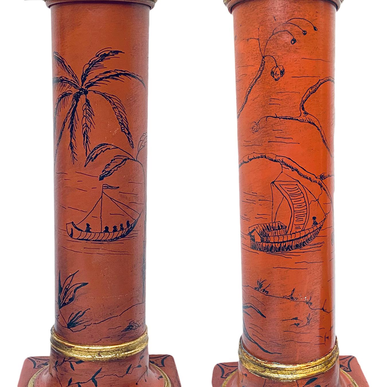 Pair of circa 1940s red tole French table lamps with painted chinoiserie decoration. 

Measurements:
Height of body 17