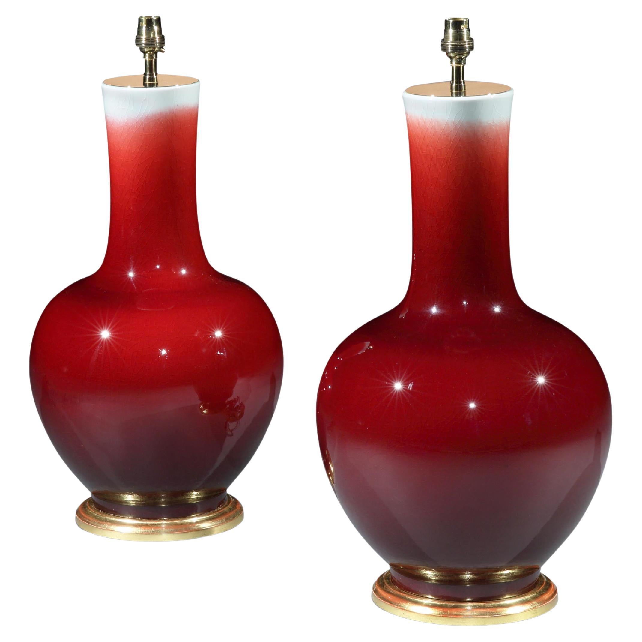Pair of Red Craquellure Sang de Boeuf Straight Neck Table Lamps