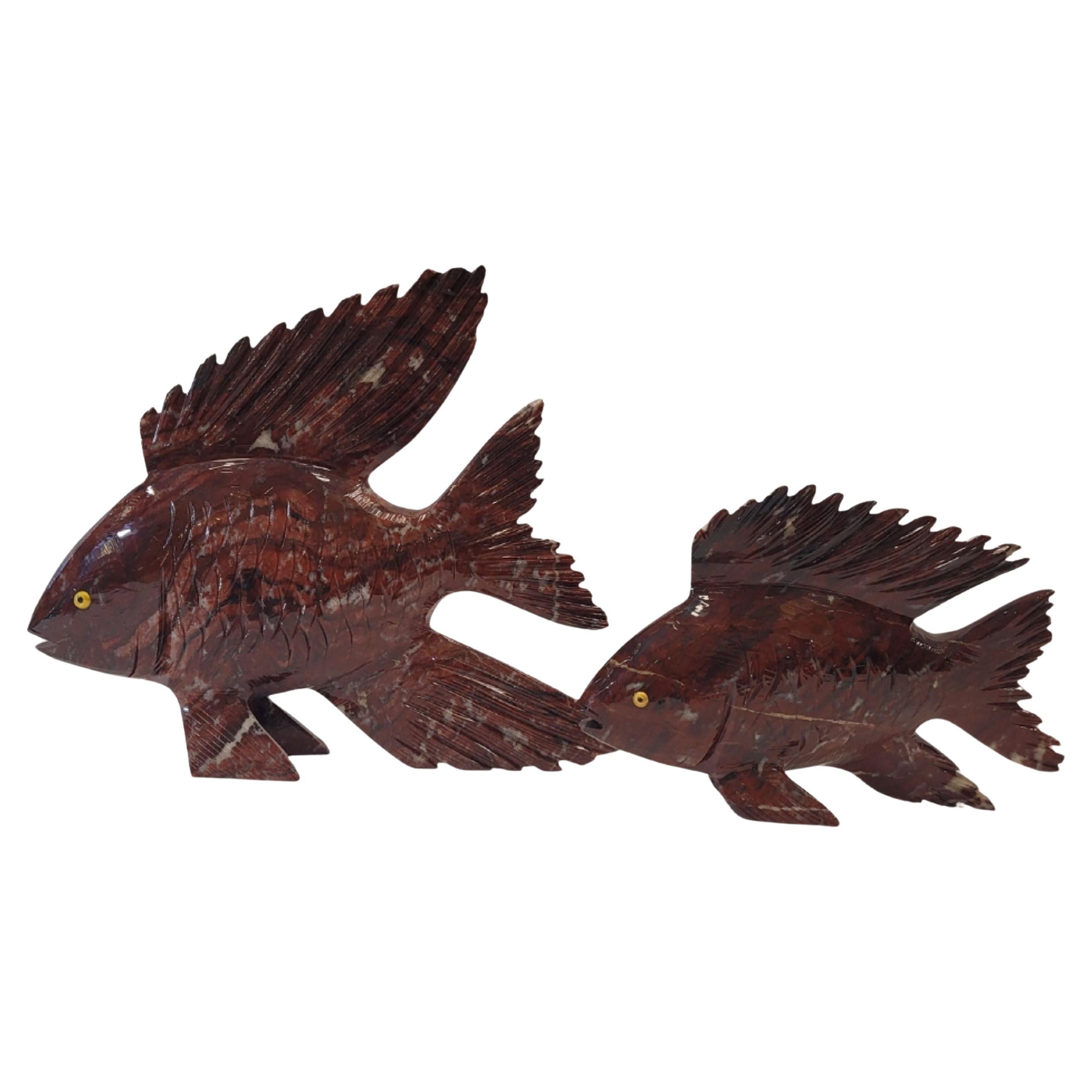 Pair of Red fish of Chinese sculpted in a single block of Red Jasper.
