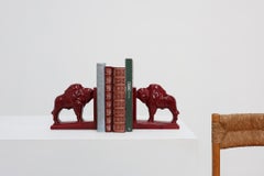 Pair of red glazed ceramic Bison ox bookends in Art Deco style, Belgium 1920s
