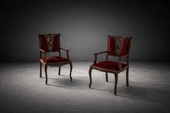Pair of red Italian Art Nouveau armchairs in the style of Georges De Feure