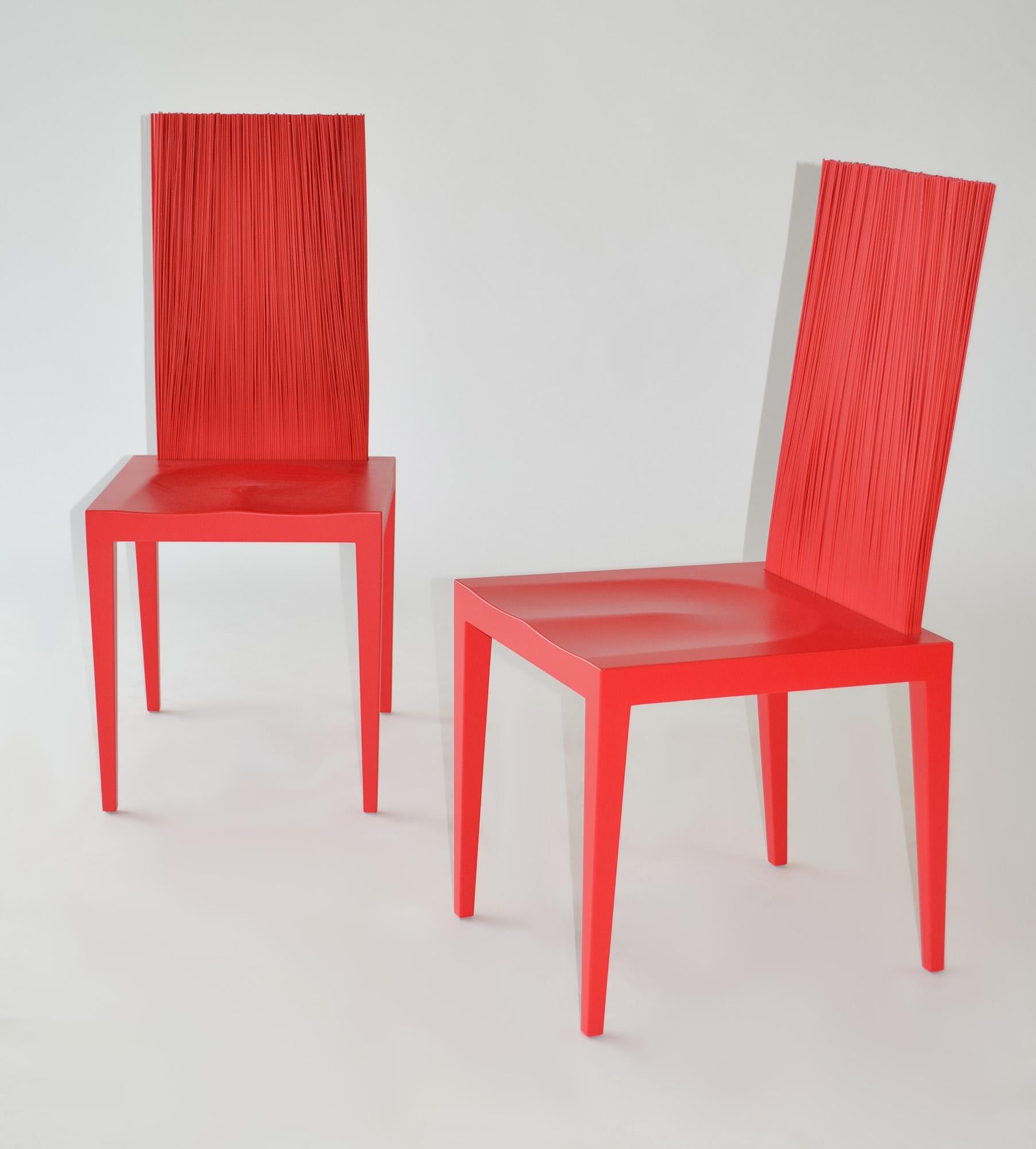  Pair of Chairs by the Campana Brothers for Edra, 'Jenette' 
Pair of Red Jenette chairs by Fernando and Humberto Campana for Edra, Italy, 21st century.

Metal structure dipped and cast in rigid polyurethane, coated with red opaque polyurethane