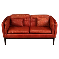 Pair of Red Leather Loveseats