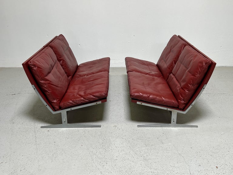 A pair of BO561 sofas in original red leather designed by Preben Fabricius & Jørgen Kastholm, 1962.