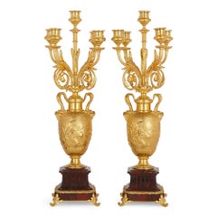 Pair of red marble and gilt bronze table candelabra by Barbedienne