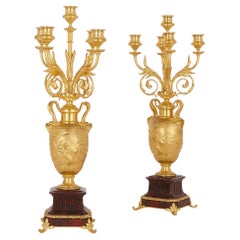 Pair of red marble and gilt bronze table candelabra by Barbedienne