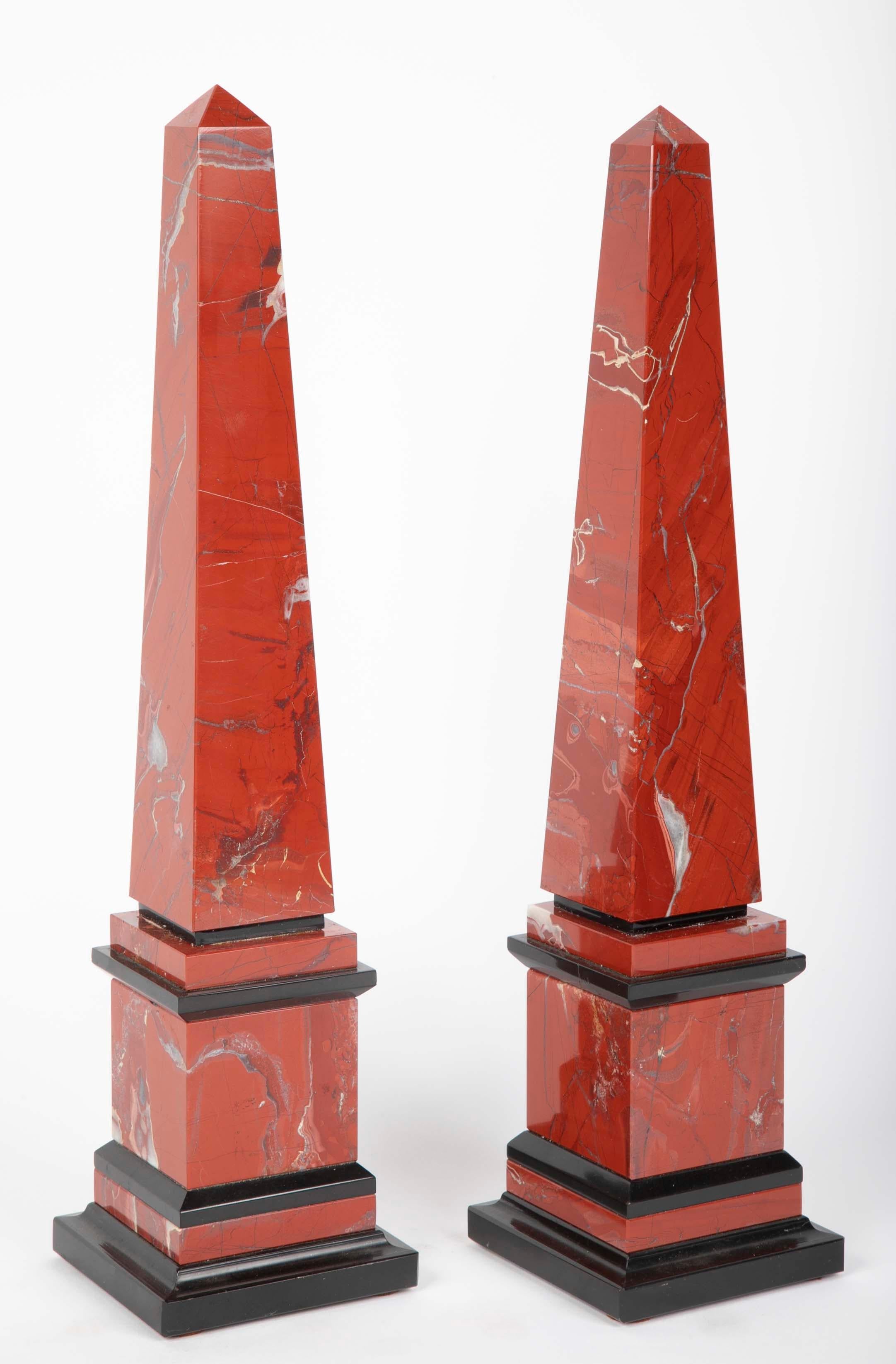 Pair of red marble obelisks from the 1920s.