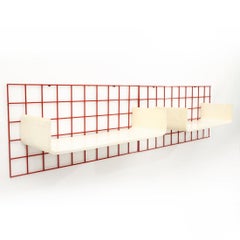 Pair of red metal grid and white curved plywood shelving unit, 1970s