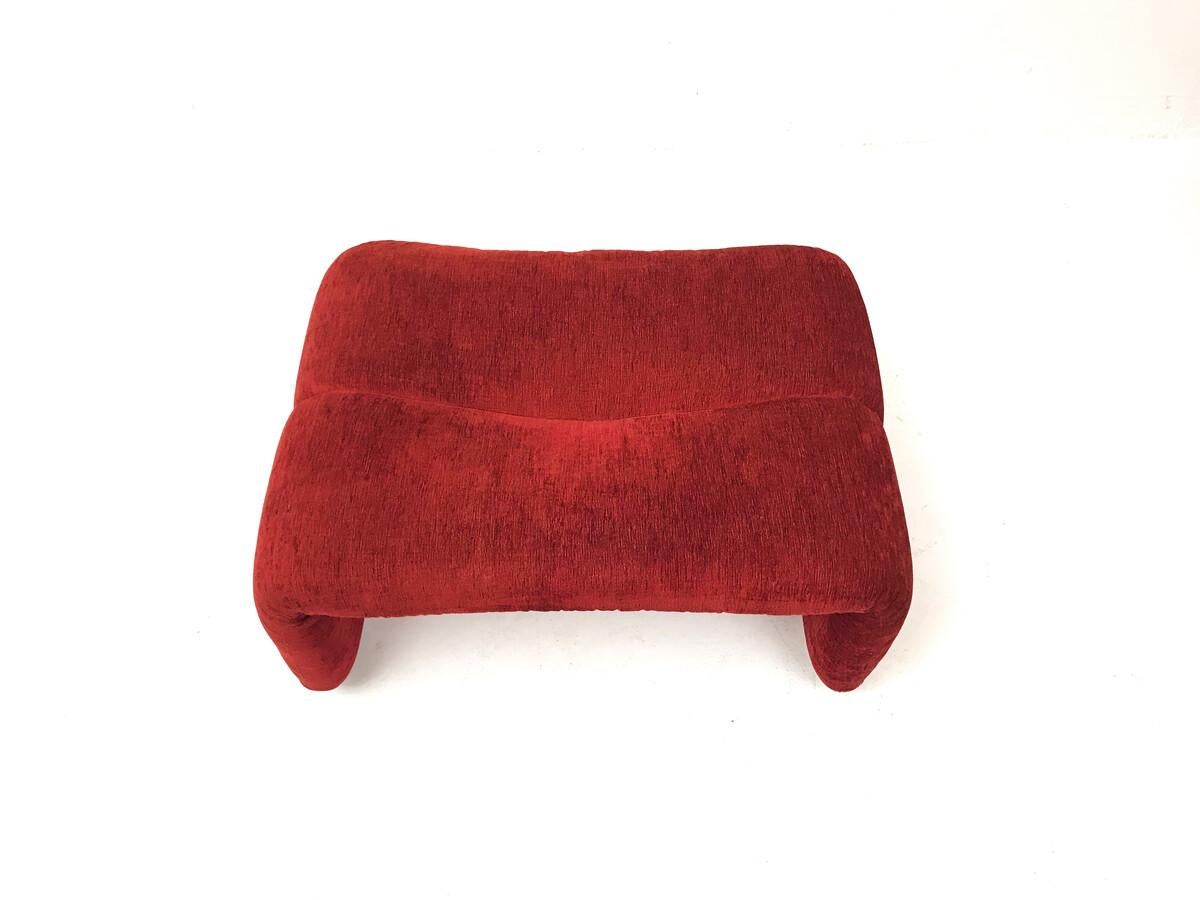 Pair of red mid-century armchairs with ottoman, model Coronado 1