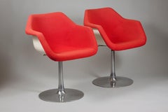 Pair of Red Mid-Century Modern Chrome Legged Swivel Armchairs by Robin Day