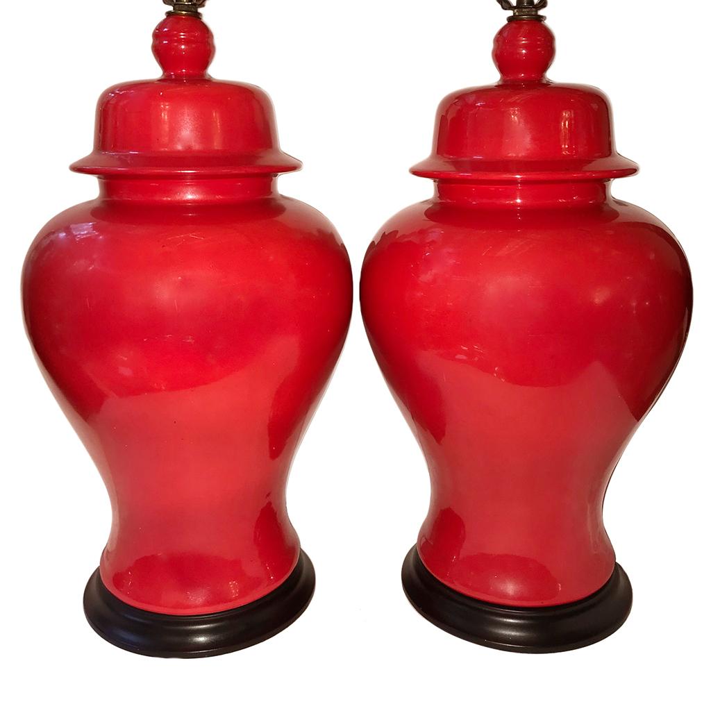 Pair of circa 1940s French porcelain ginger jar-shaped table lamps with ebonized base.

Measurements:
Height of body 19