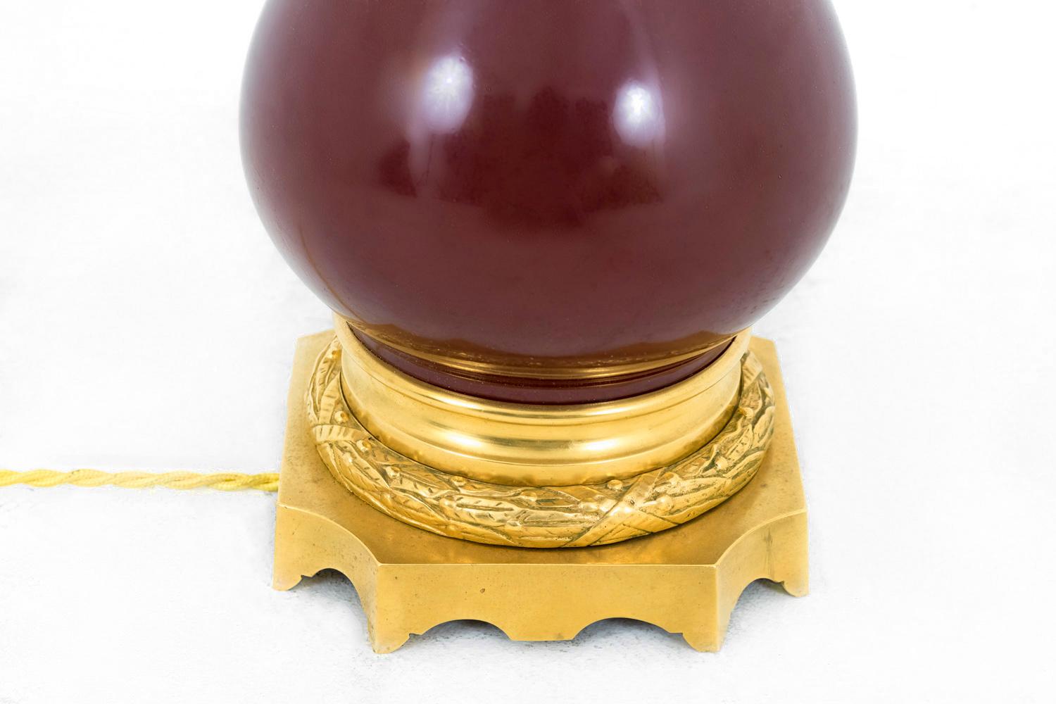 Gilt Pair of Red “sang-de-bœuf” Porcelain Lamps, 19th Century