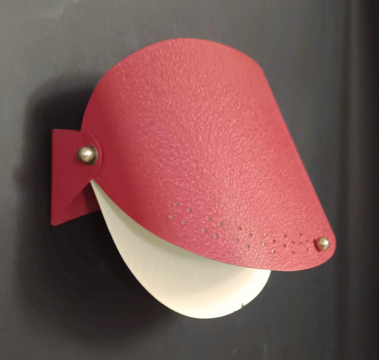 Vintage Italian wall light with adjustable red tin shades / Made in Italy, circa 1960s
Measures: height 5.9 inches, width 9 inches, depth 4 inches
1 Light / E26 or E27 type / max 60W
1 Pair available in stock in Italy.
 