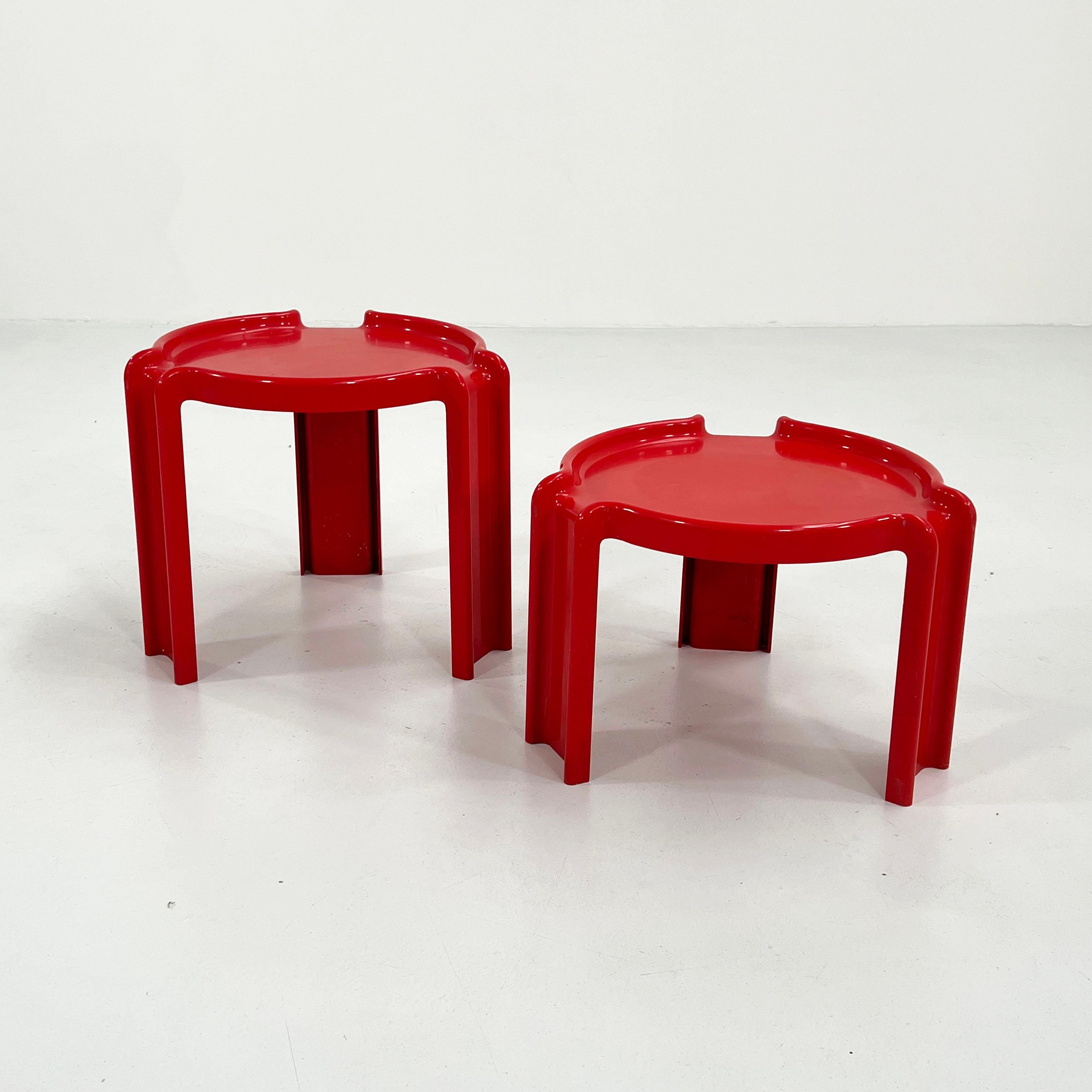 Designer - Giotto Stoppino
Producer - Kartell
Model - Nesting Tables
Design Period - Seventies
Measurements - Width 47 cm x Depth 47 cm x Height 41 & 33 cm
Materials - Plastic
Color - Red
Condition - Good 
Comments - Light wear consistent with age