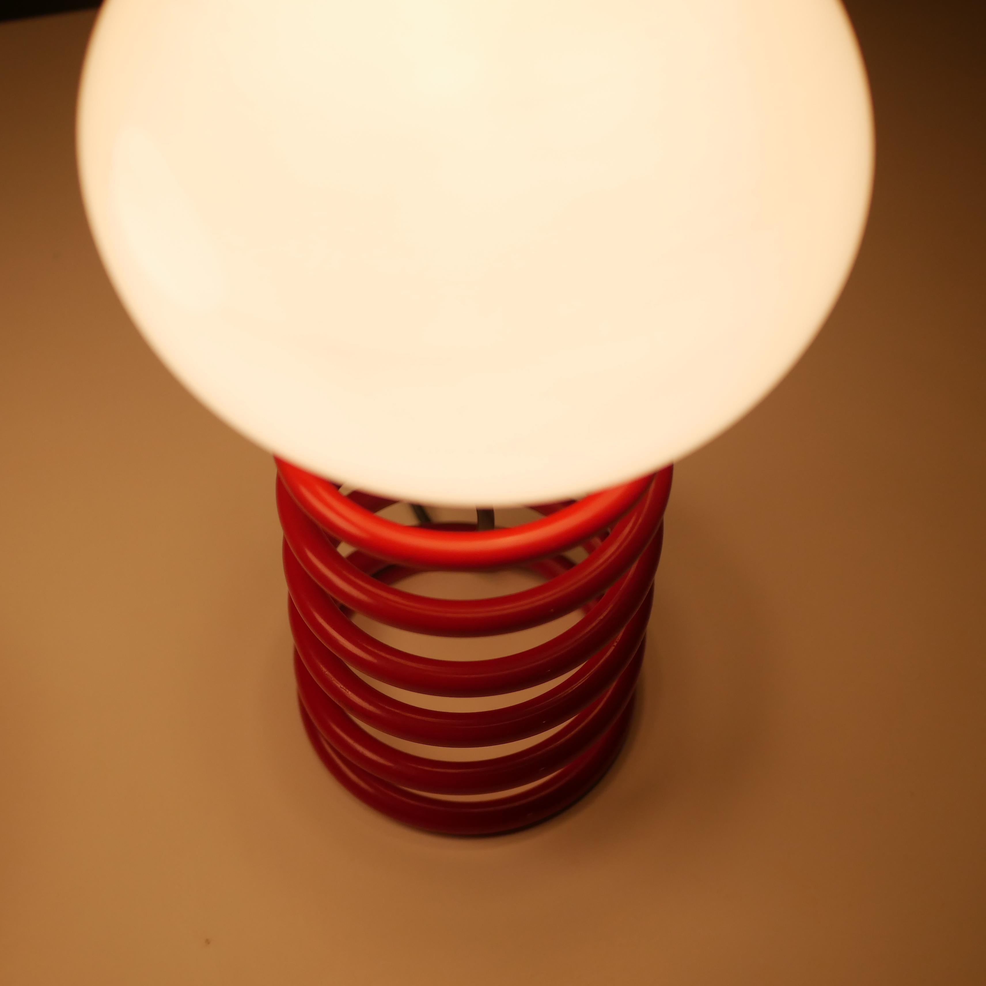 Pair of red spring table lamps attributed to Ingo Maurer, 1970s 3