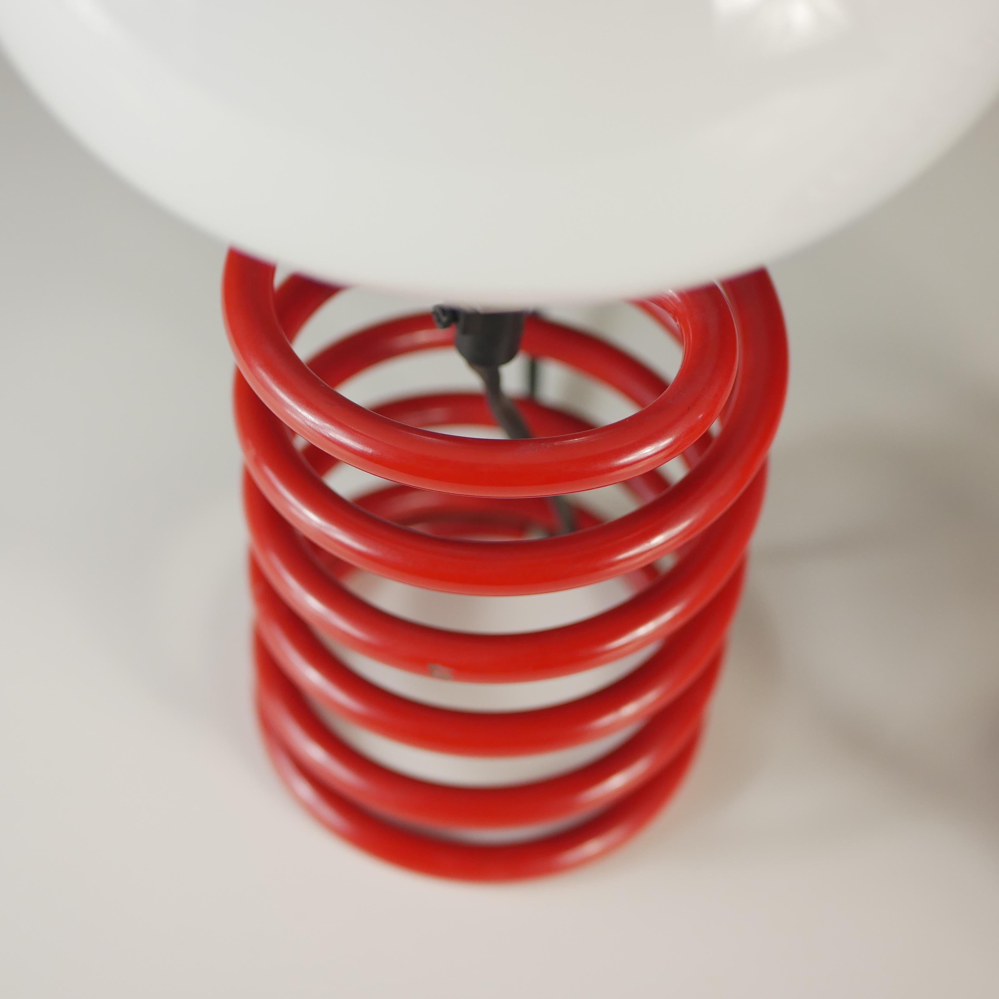 Metal Pair of red spring table lamps attributed to Ingo Maurer, 1970s For Sale