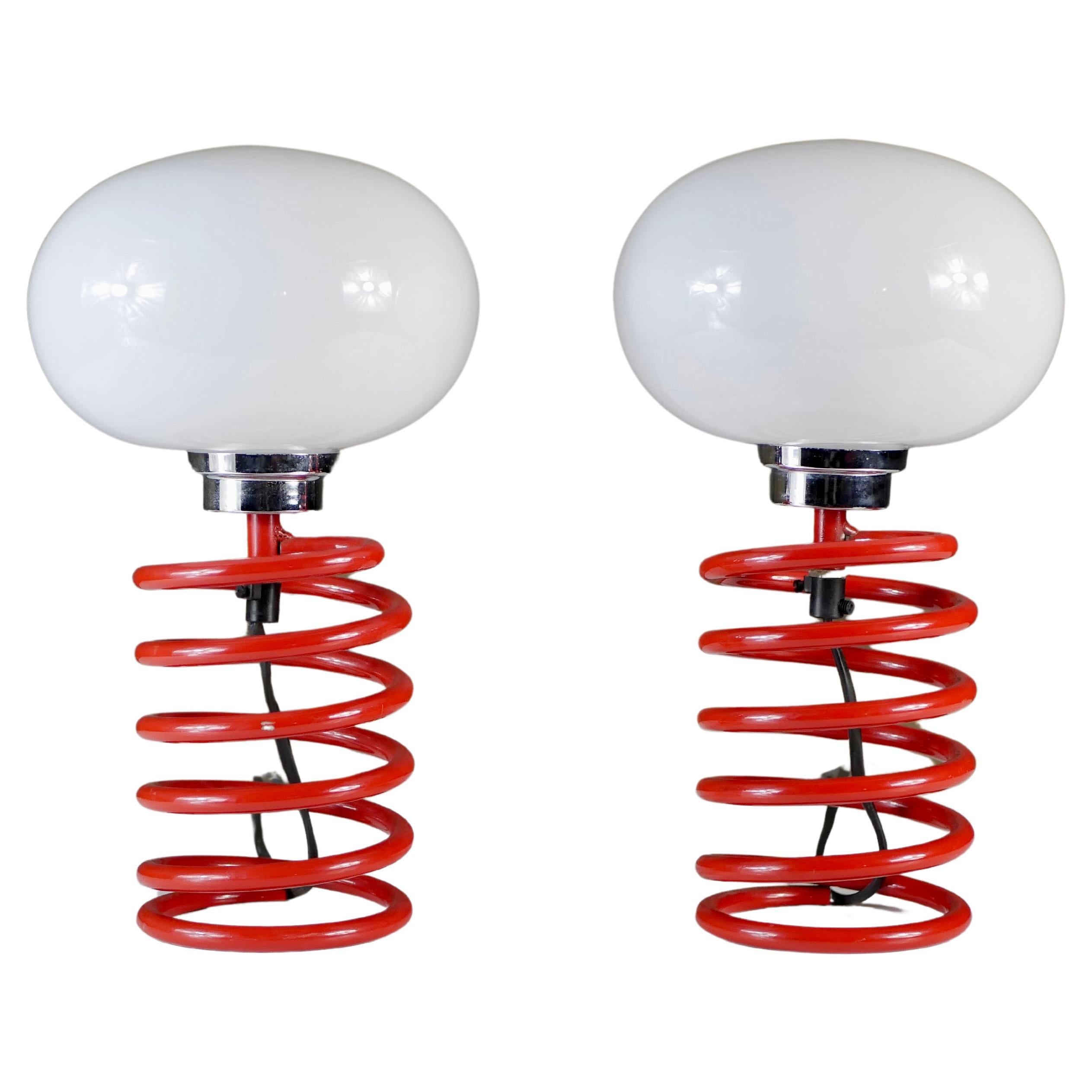 Pair of red spring table lamps attributed to Ingo Maurer, 1970s For Sale