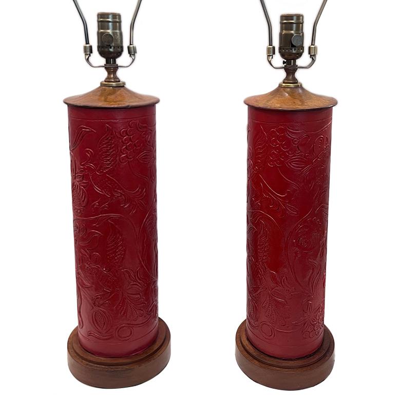 Pair of 1950's French red leather lamps with birds and foliage.

Measurements:
Height of body: 18