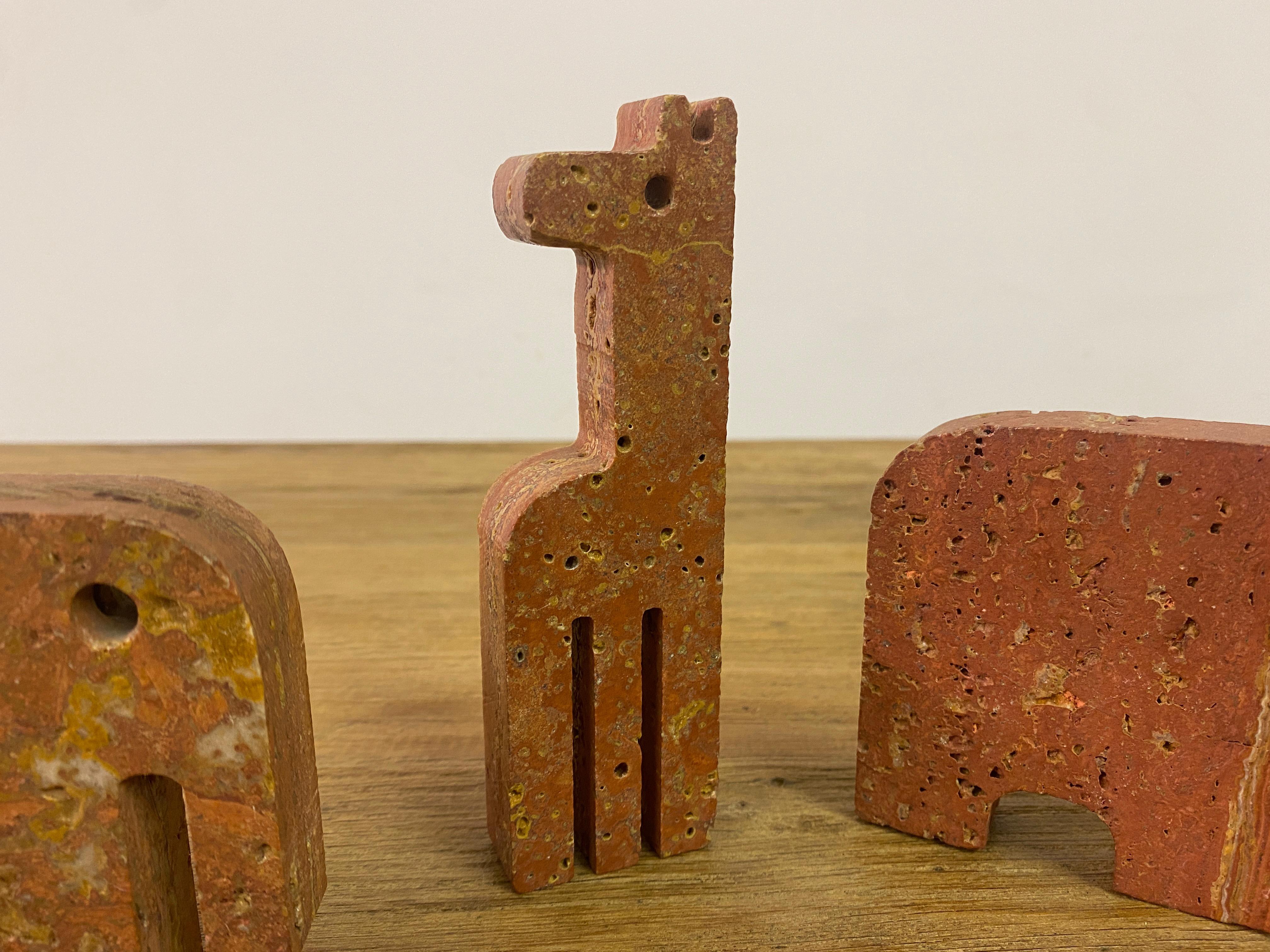 Pair Of Red Travertine Elephant Bookends And A Giraffe In Good Condition For Sale In London, London