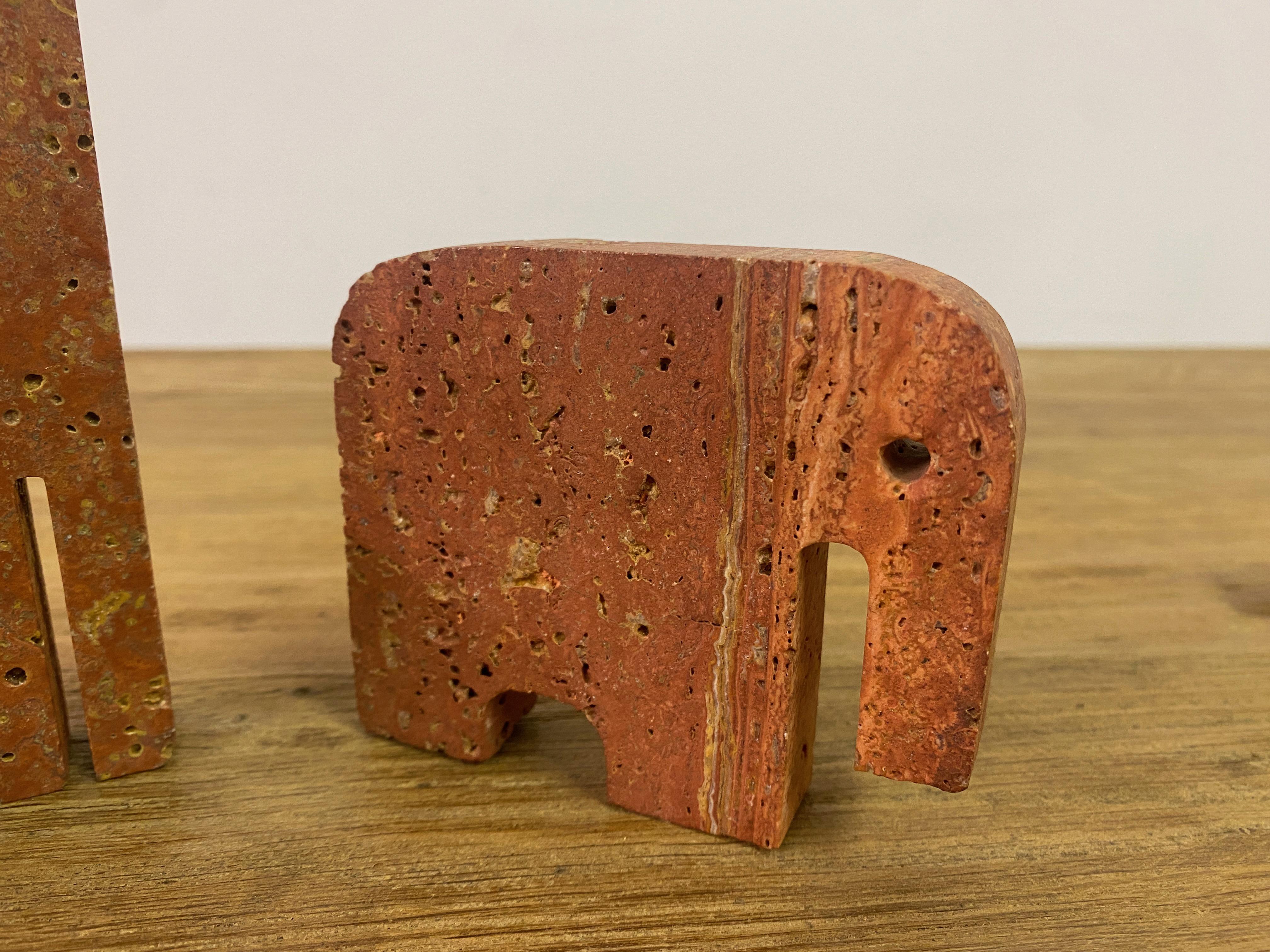 20th Century Pair Of Red Travertine Elephant Bookends And A Giraffe