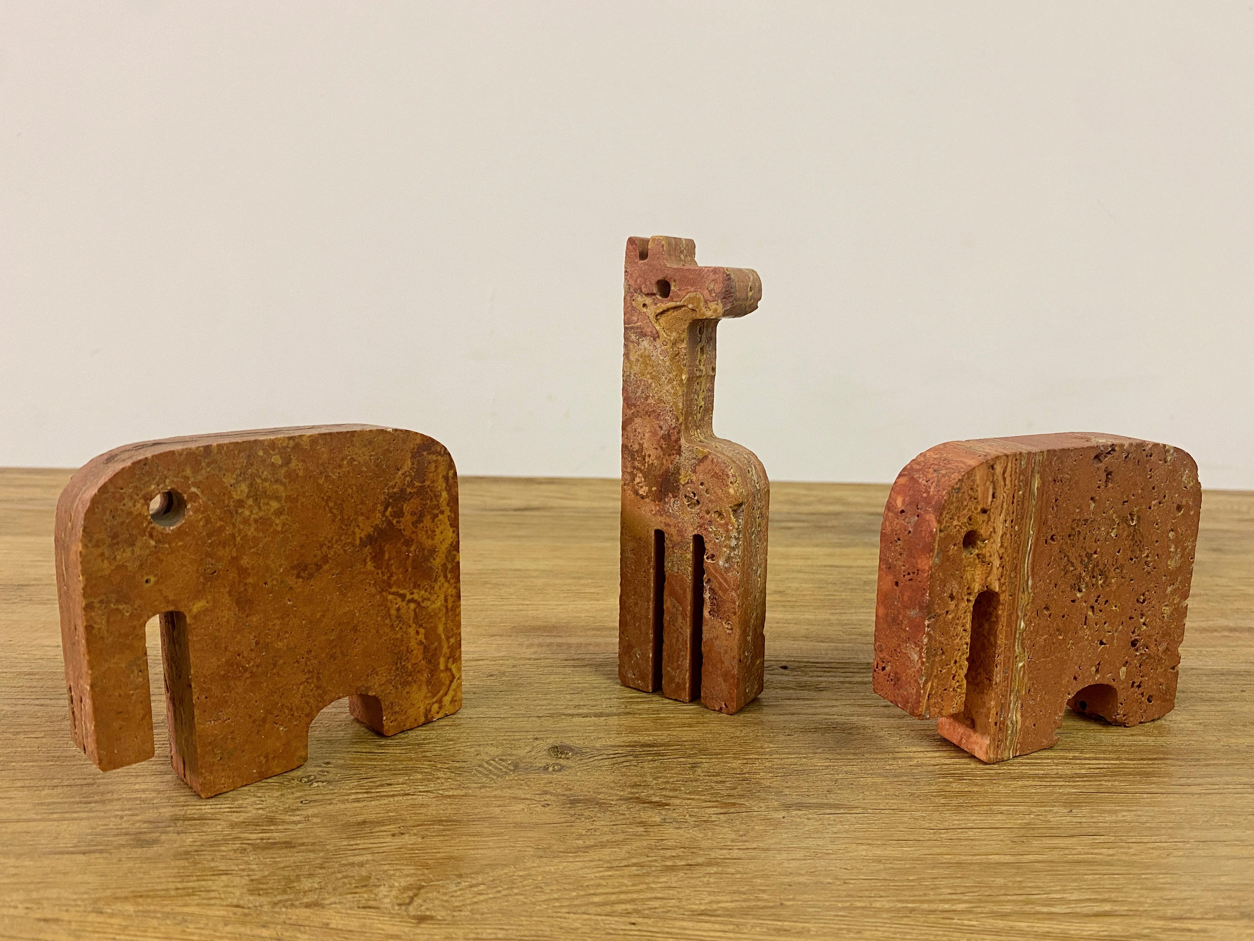 Pair Of Red Travertine Elephant Bookends And A Giraffe 1