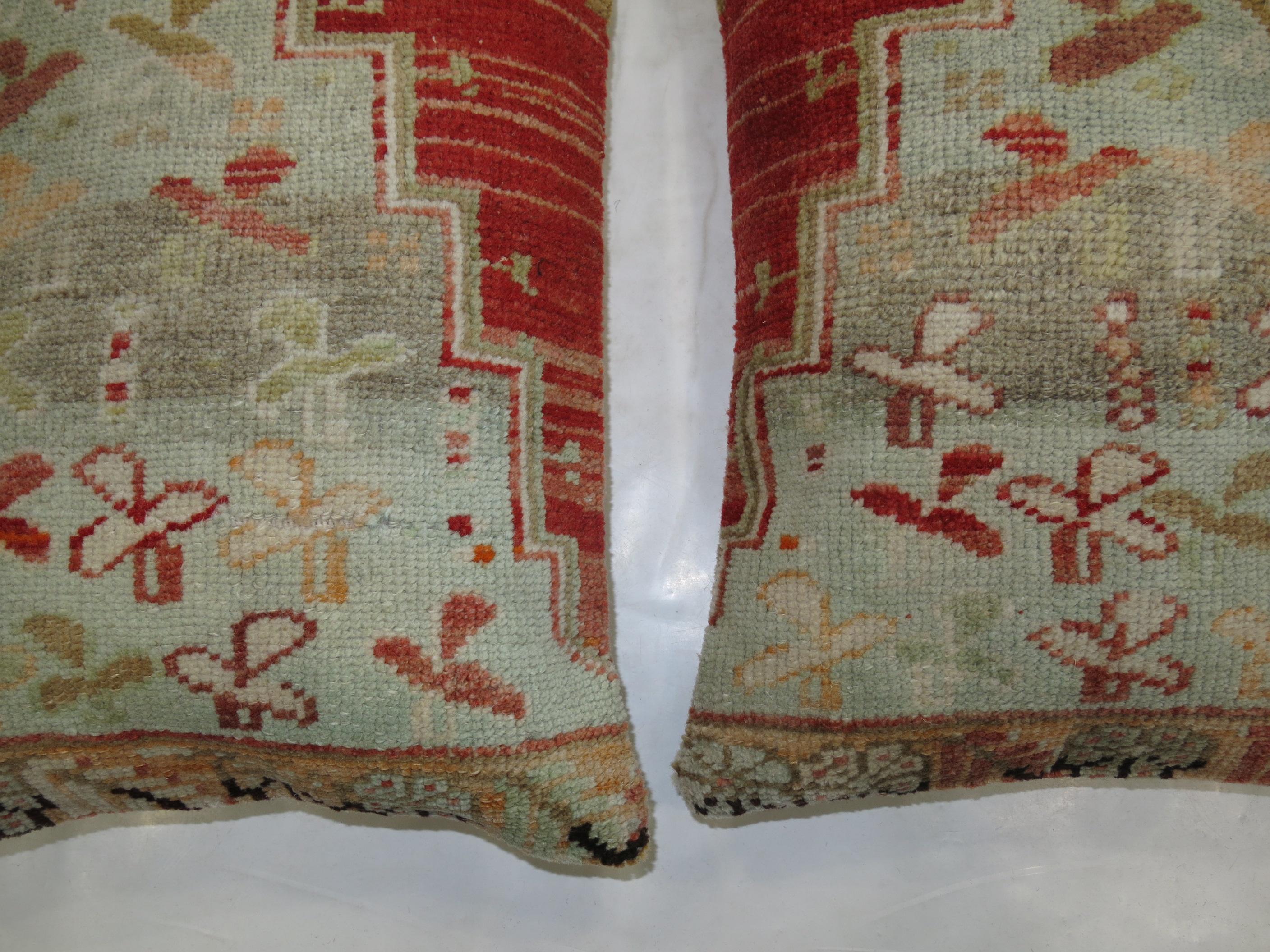Set of pillows from a 20th century Chinese rug each measuring 13'' x 18'' and 14'' x 19''.