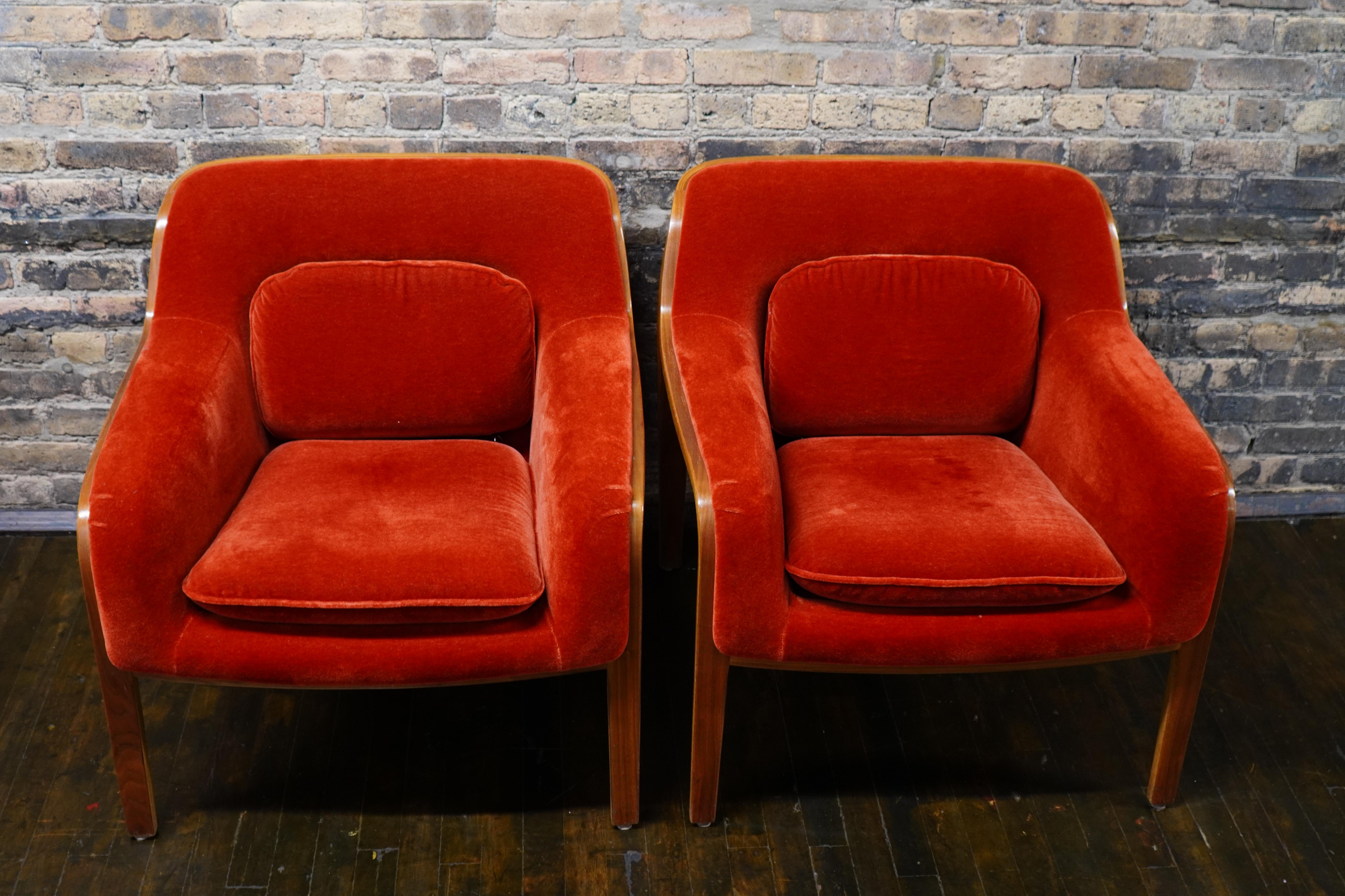 A lovely pair of lounge chairs, the Knoll 1315 chair, also known as the Stephens Chair, designed by Bill Stephens for Knoll in the late 1960s.  

They feature a bentwood frame with a contoured form and loose seat and lumbar cushions.  The chair is