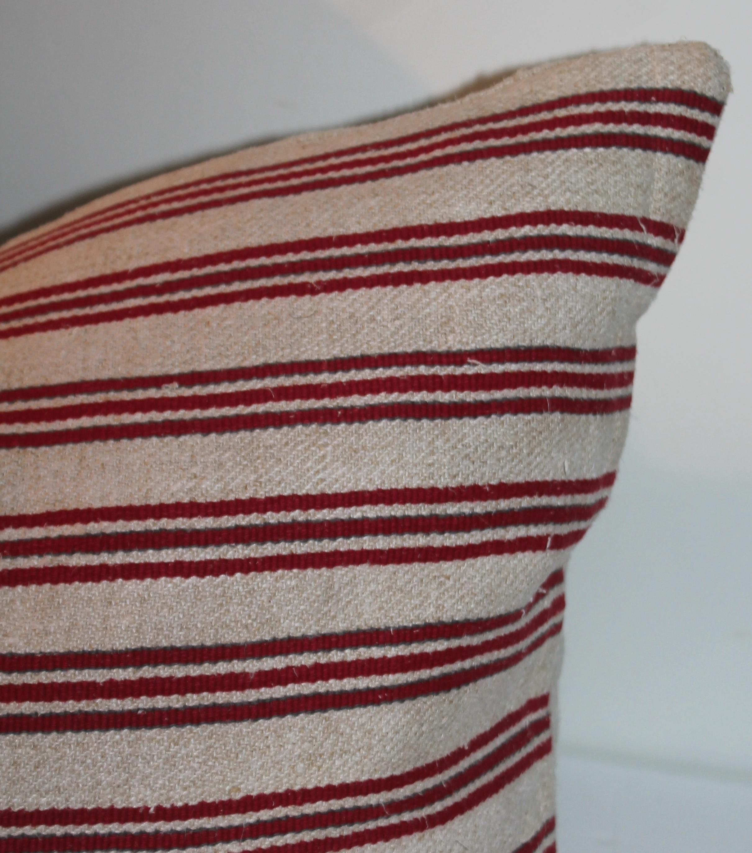 American Pair of Red & White Ticking Pillows For Sale