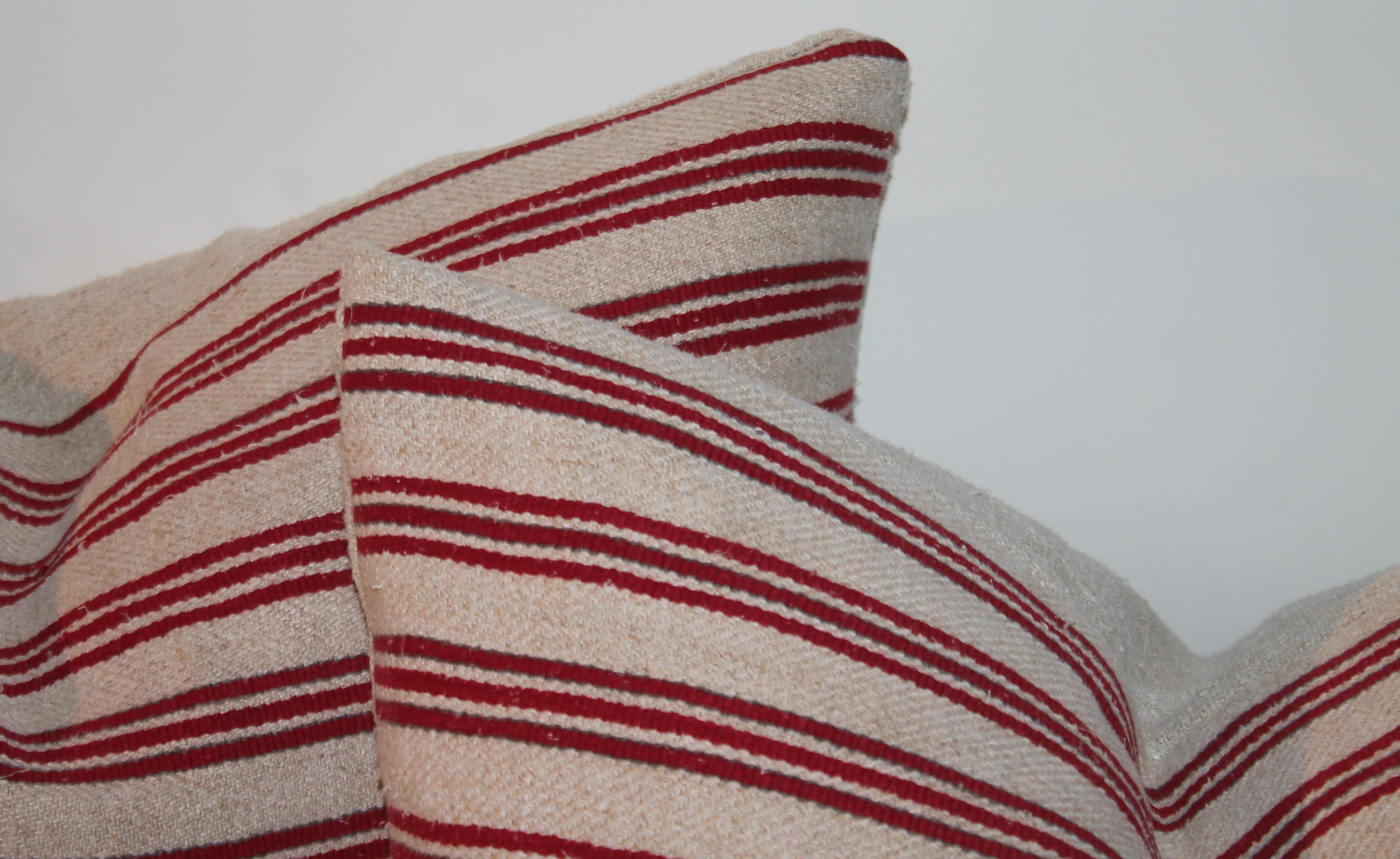 20th Century Pair of Red & White Ticking Pillows For Sale